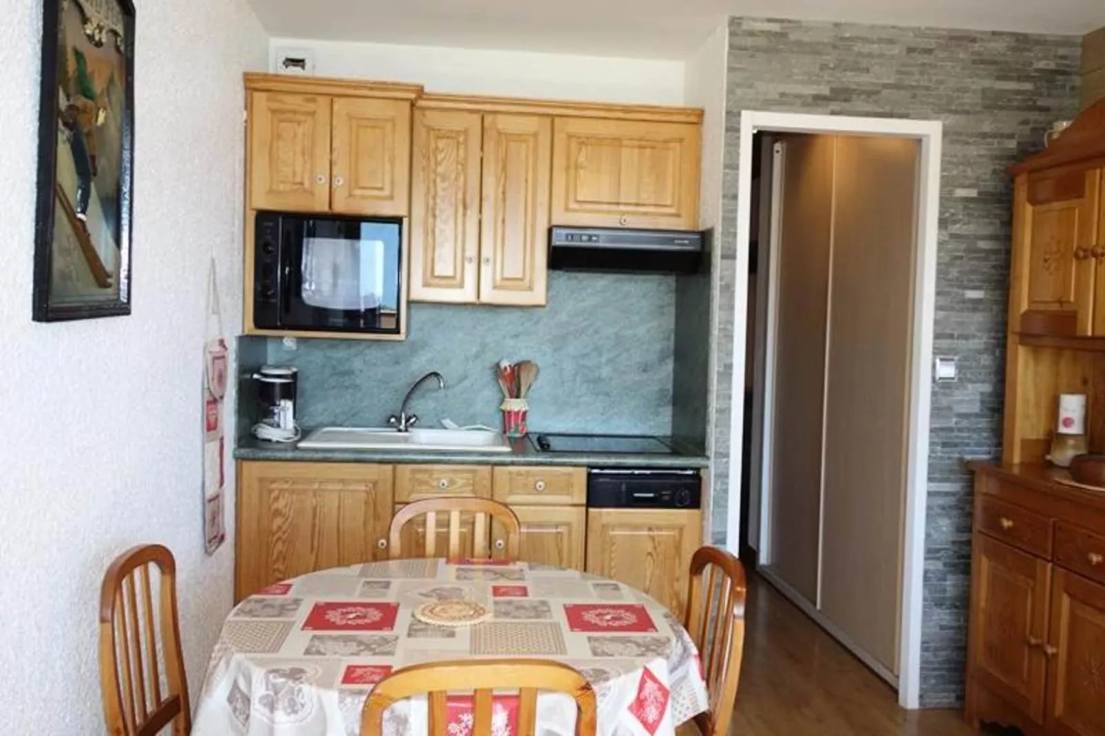 Résidence Maison De L'alpe-Eetkamer