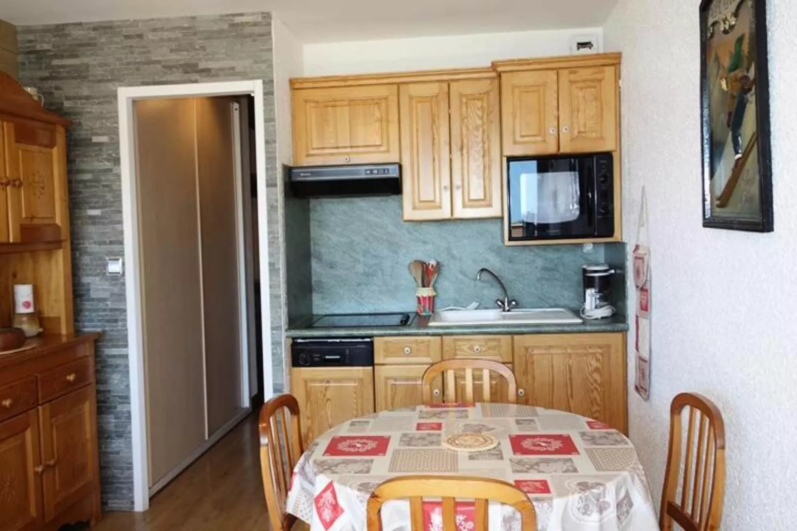 Résidence Maison De L'alpe-Eetkamer