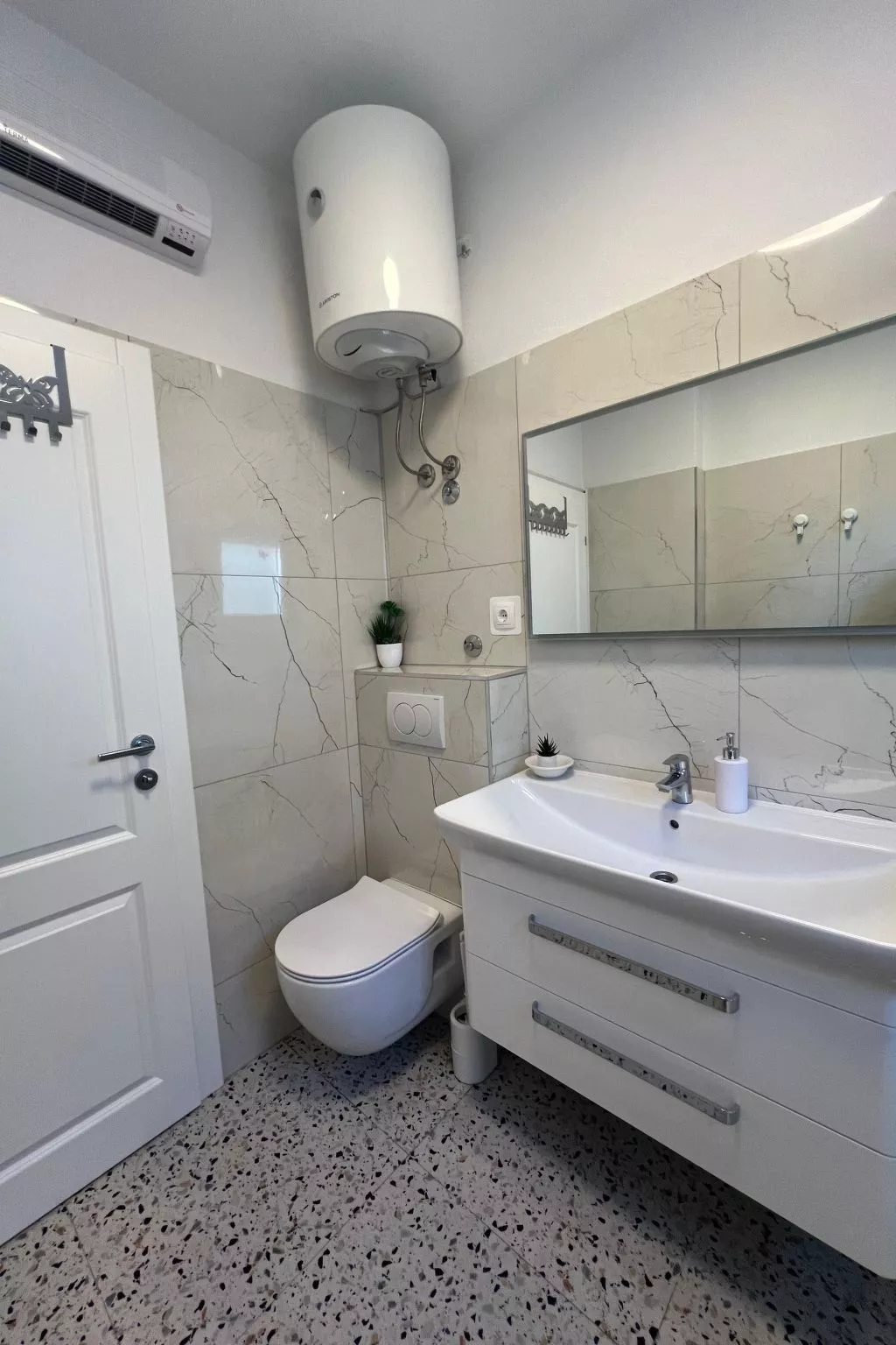 Coastal Comfort Apartment Teilen Speichern