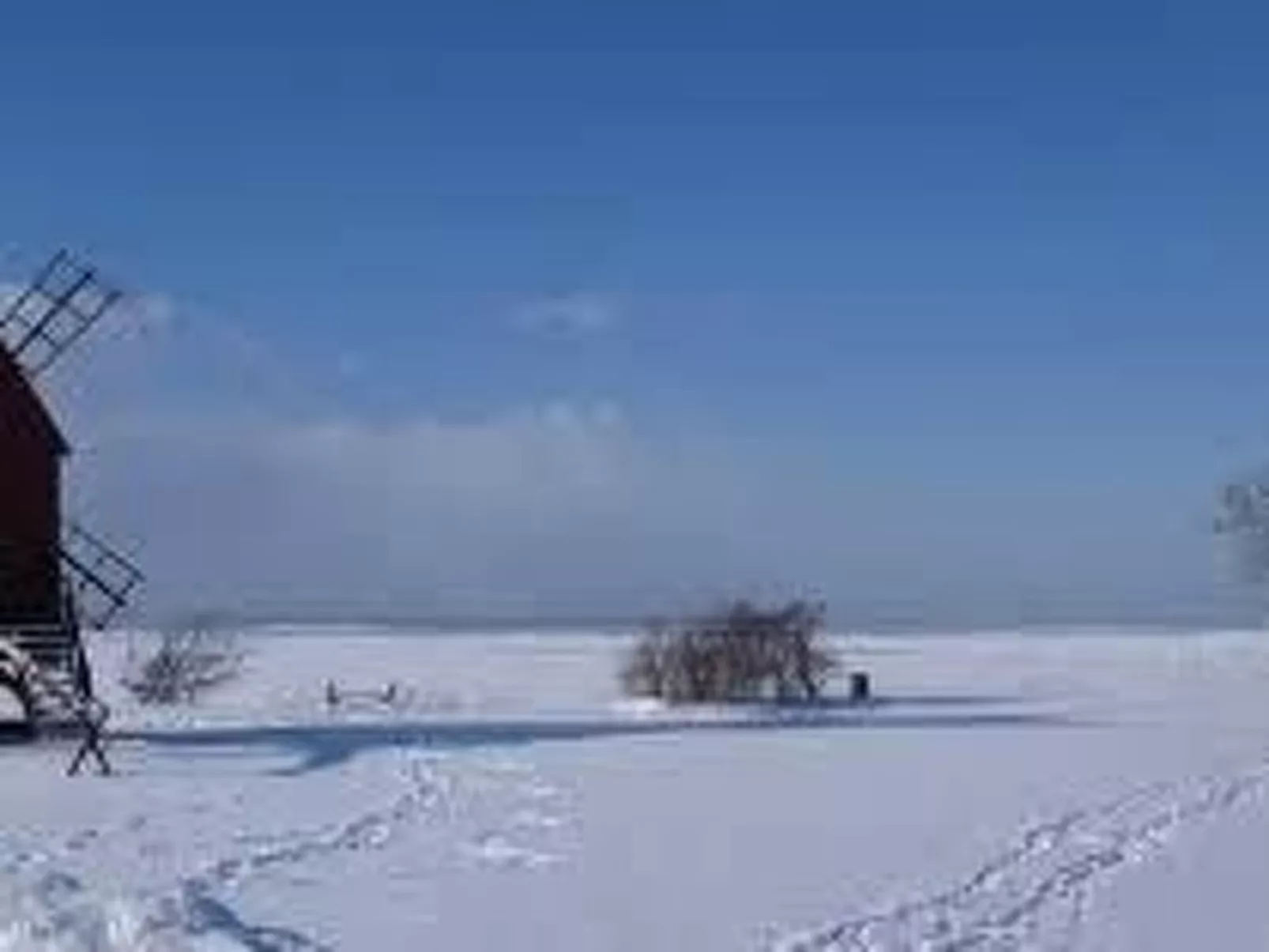 Holzhaus mit Terrasse, direkt an einer Bucht-Buiten