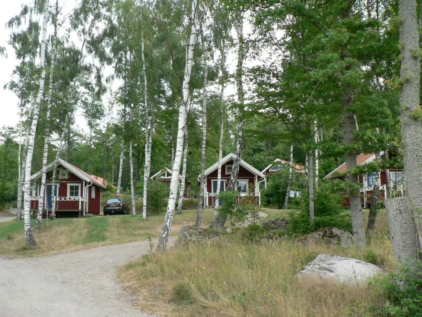 Holzhaus mit überdachter Terrasse