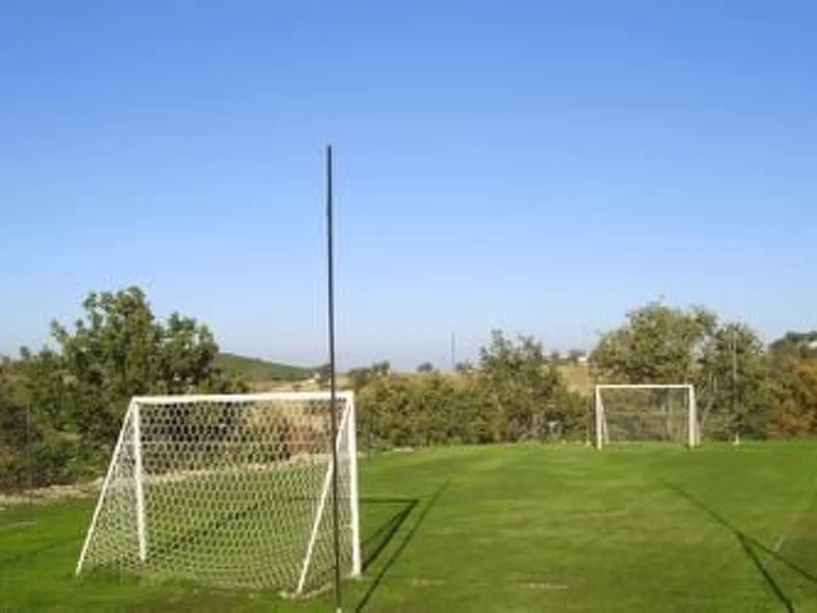 'Granatapfel' mit Schwimmbad-Buiten