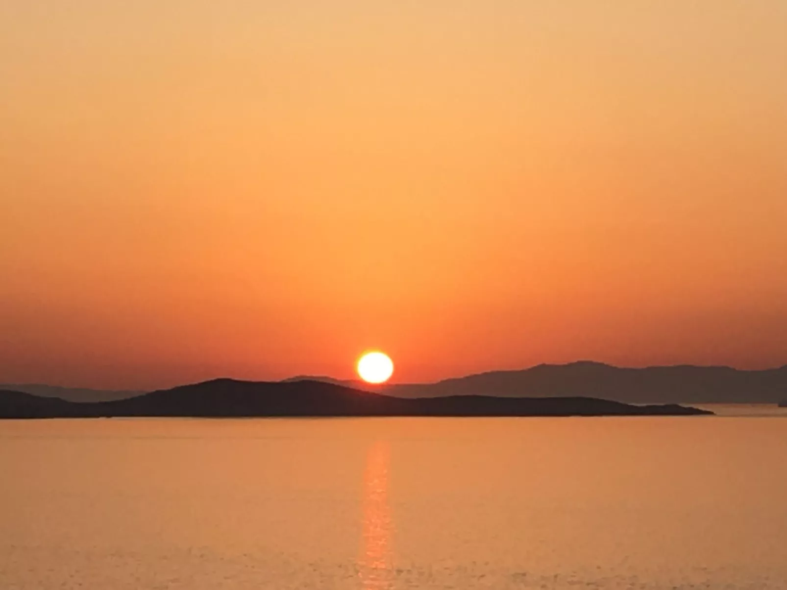 "Calypso Sunset" mit Terrasse-Buiten