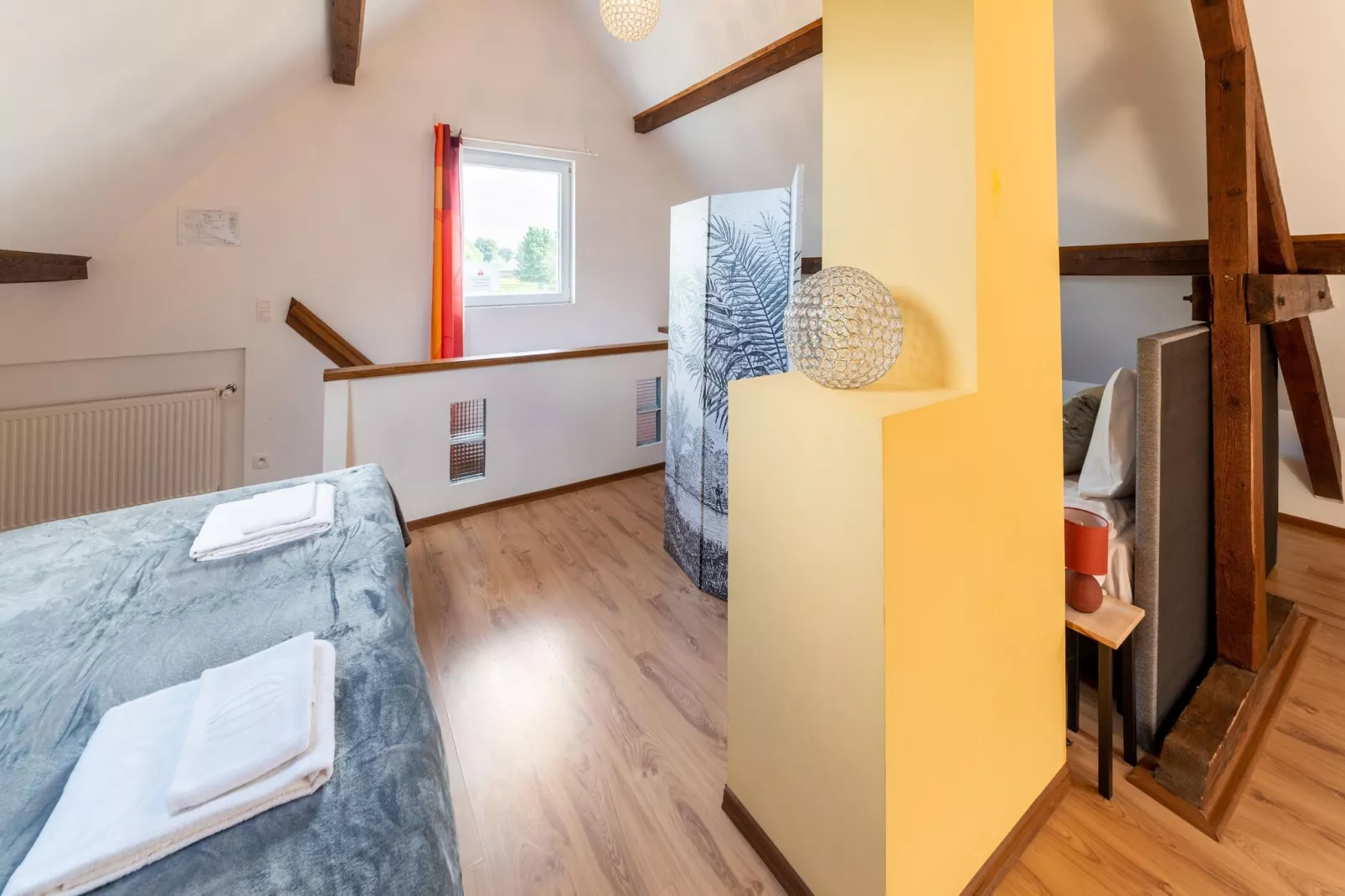 L'accueil de l'Est-Slaapkamer