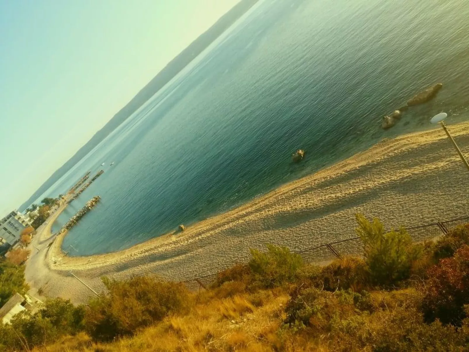Strandnahe Wohnung mit großer Terrasse-Buiten