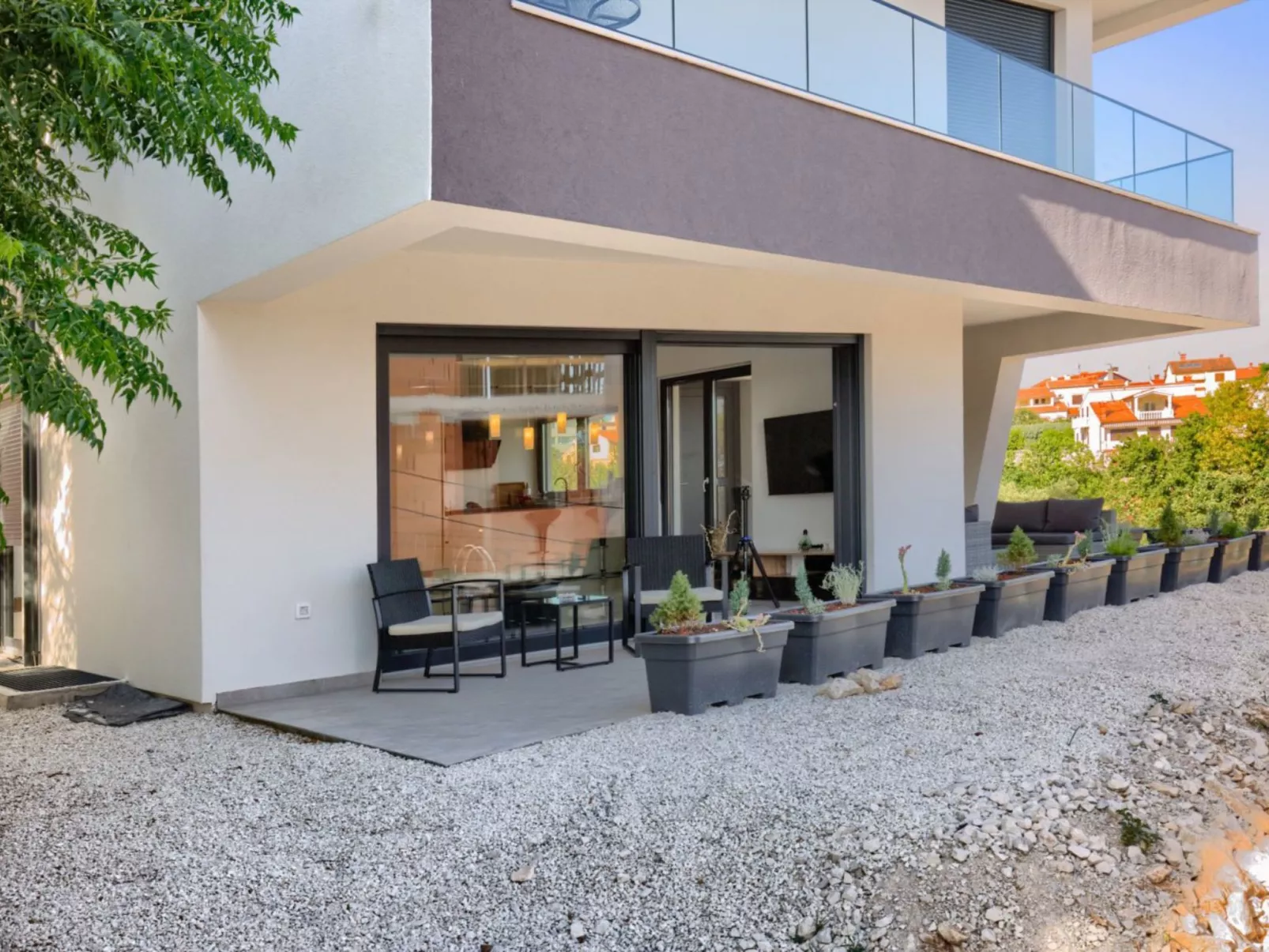 Villa Delfin mit Pool-Buiten