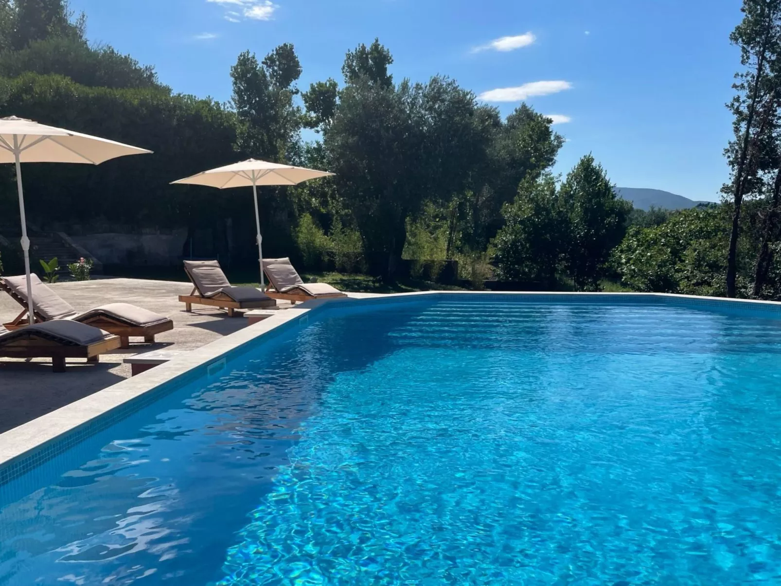 Appartement mit Pool - Buiten