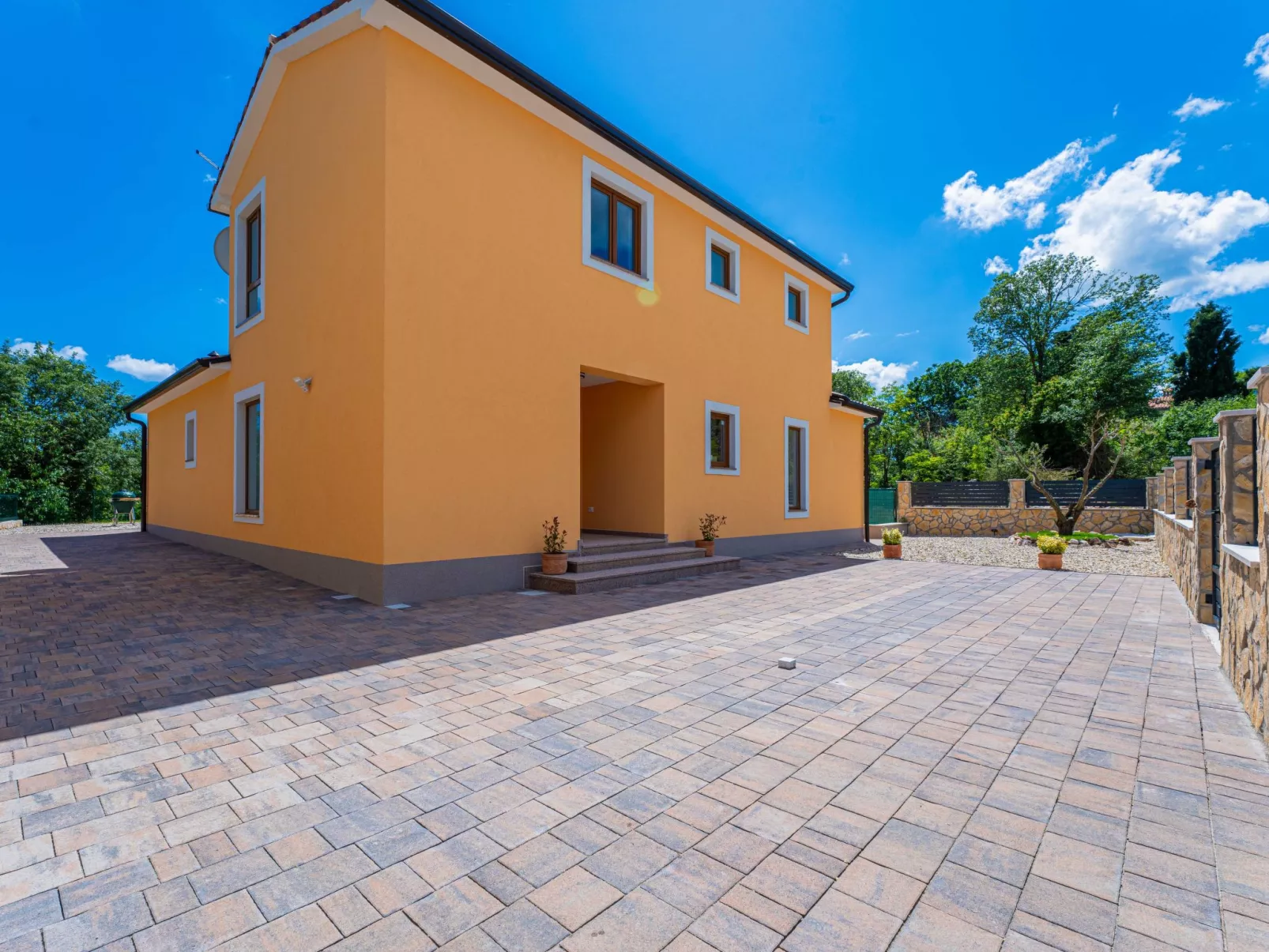 Luxuriöse Ferienvilla mit atemberaubender Aussicht-Buiten