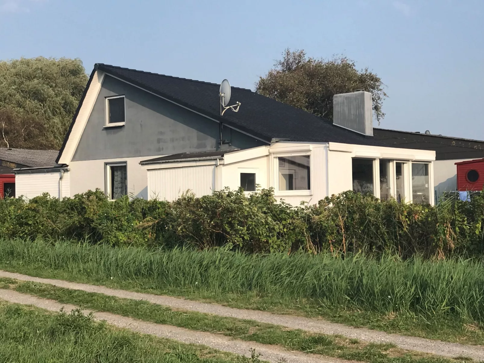 E3 Haus mit Wintergarten, Kamin und Deichblick-Buiten