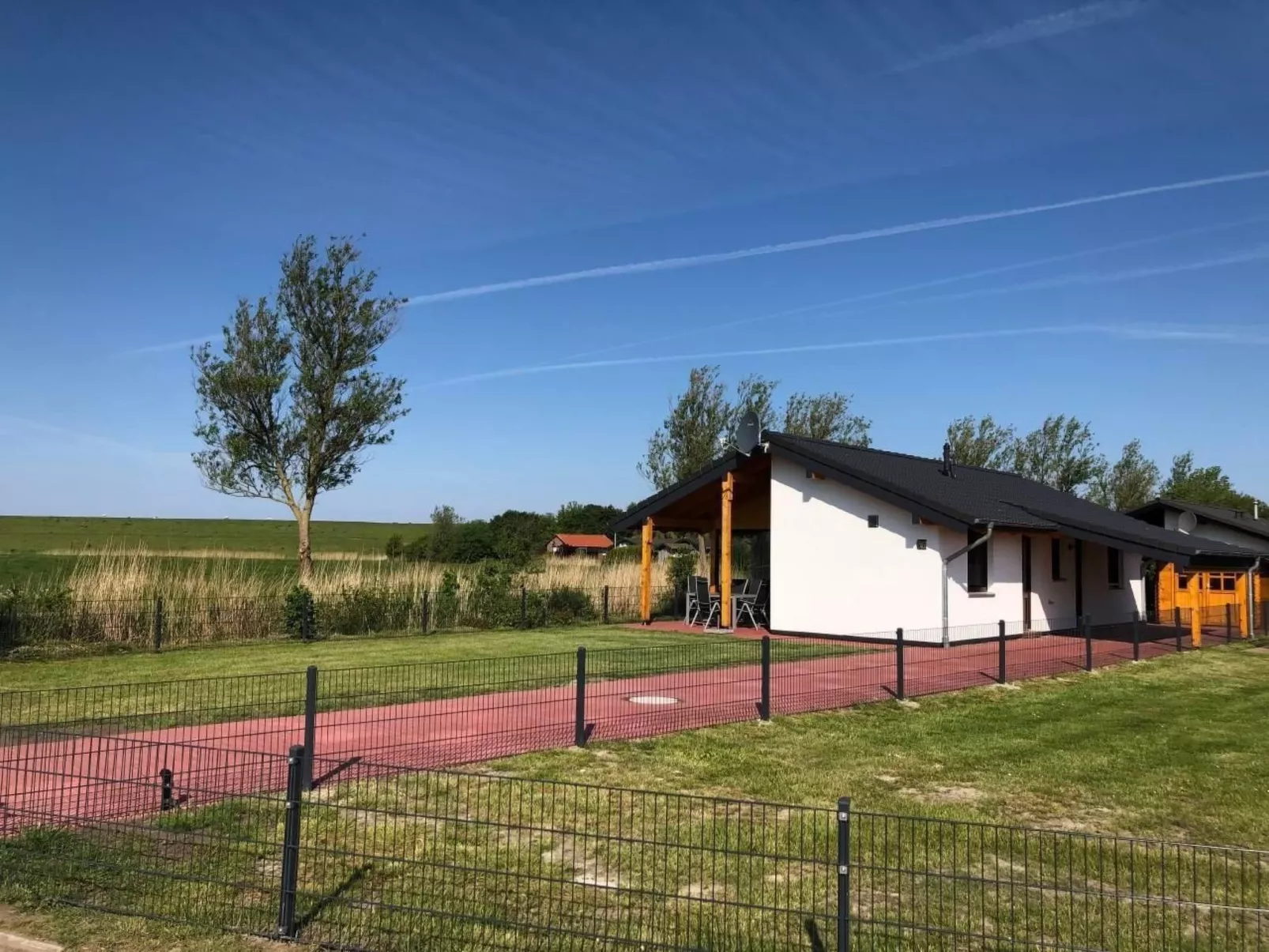 K18 Ferienhaus mit Wiesenblick in Eckwarderhörne-Buiten