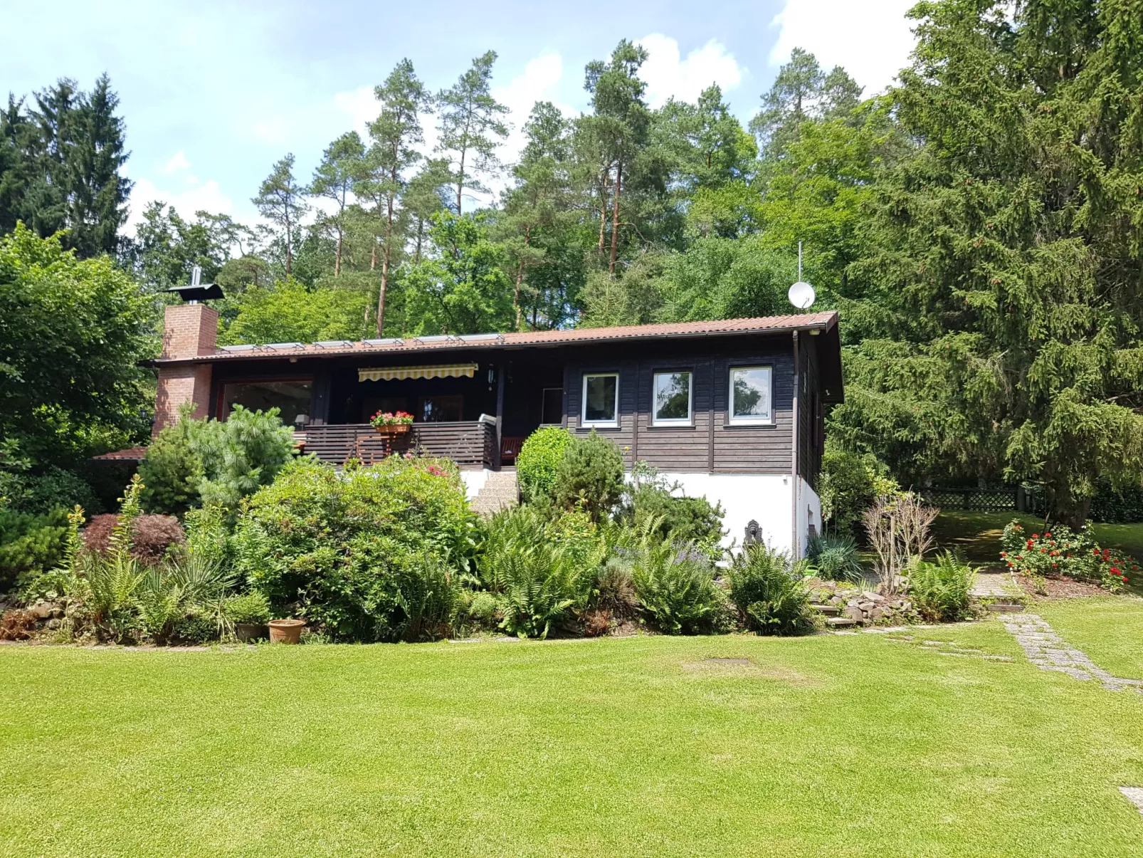 Ferienvilla mit eigener Sauna-Buiten