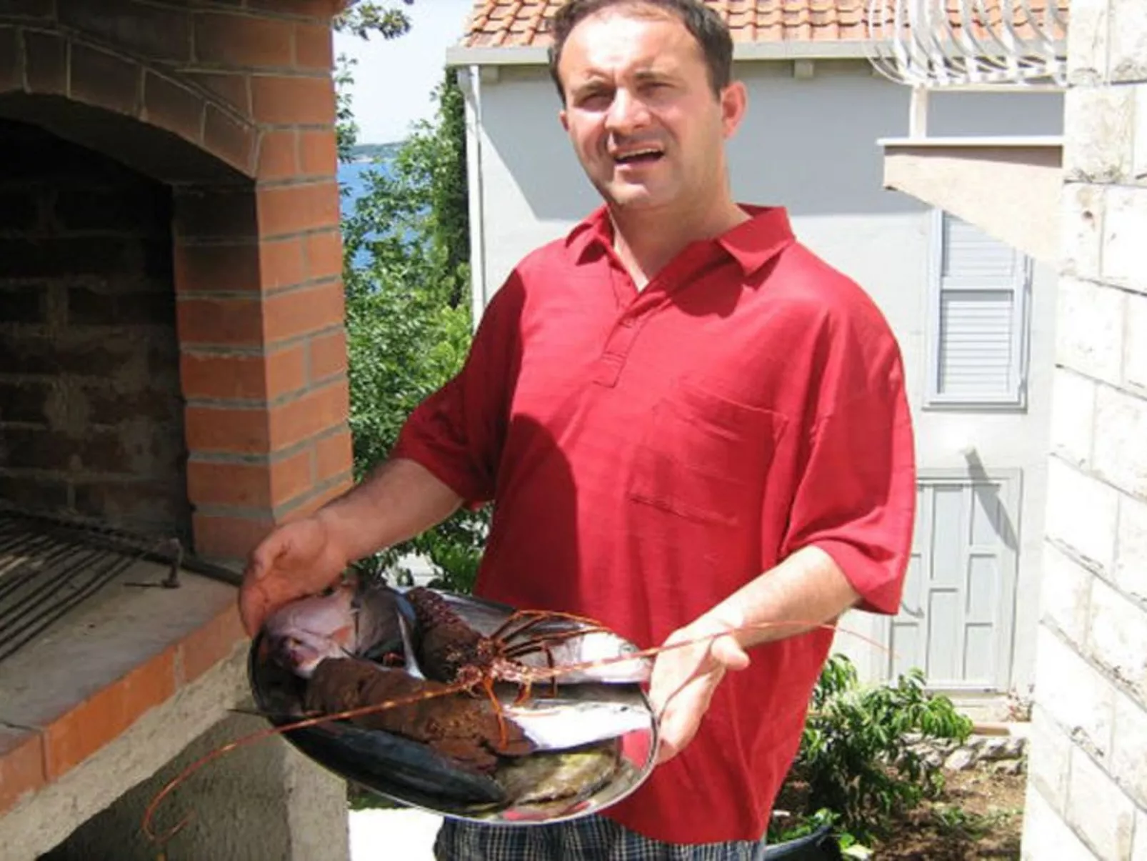 Mélanie C im ersten Stock einer Villa am Strand - Buiten