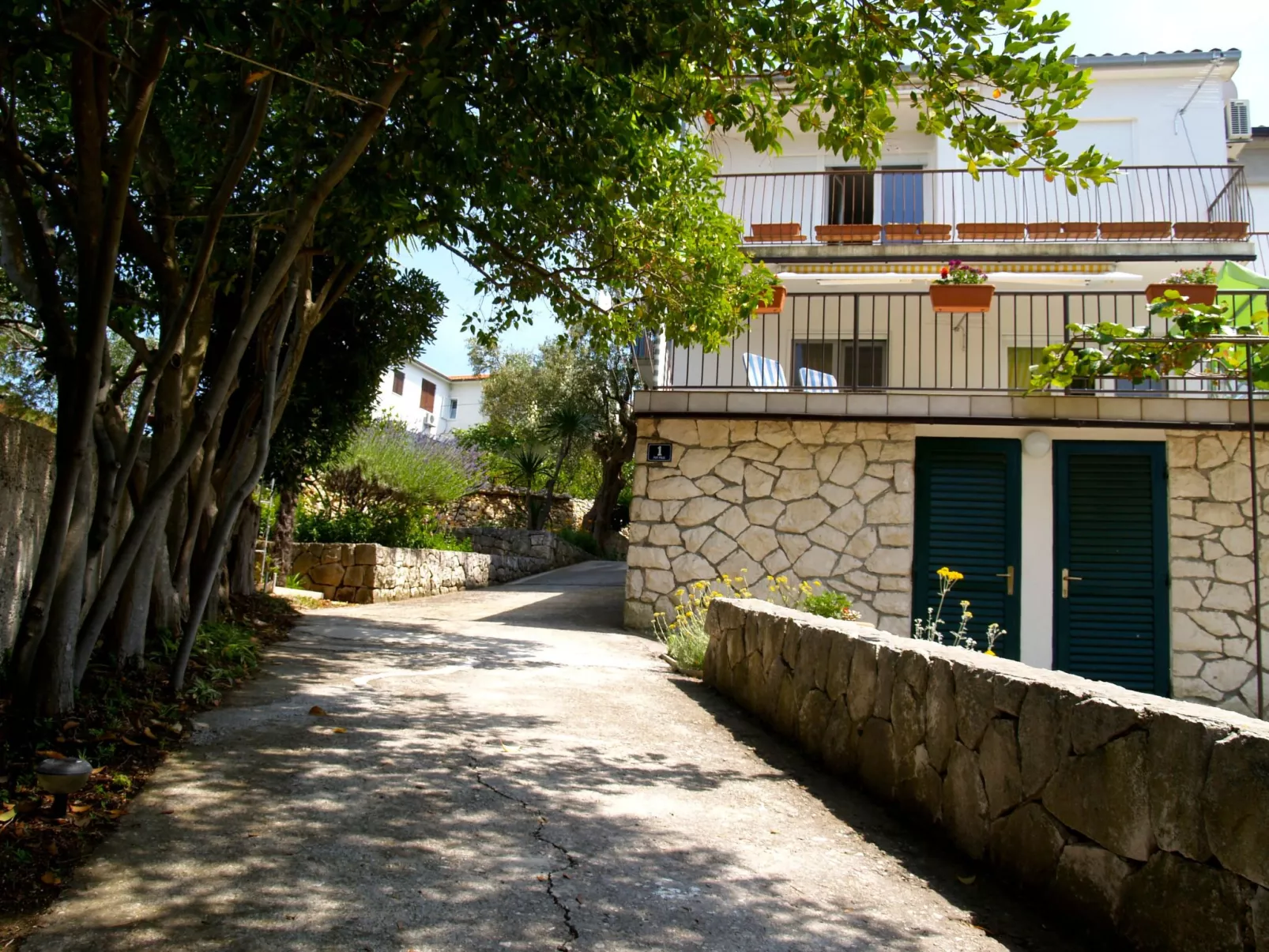Strandnahe Ferienwohnung mit großer Terrasse-Buiten