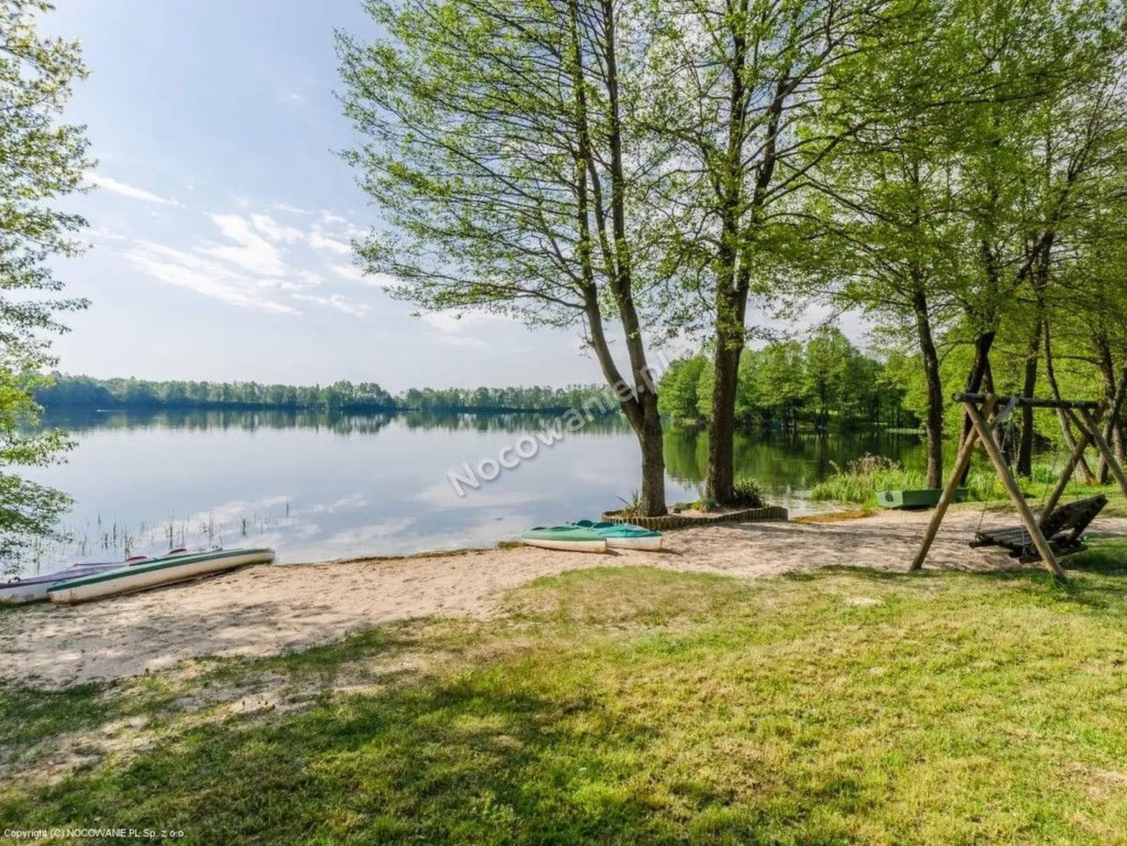Haus am See mit Sauna-Buiten