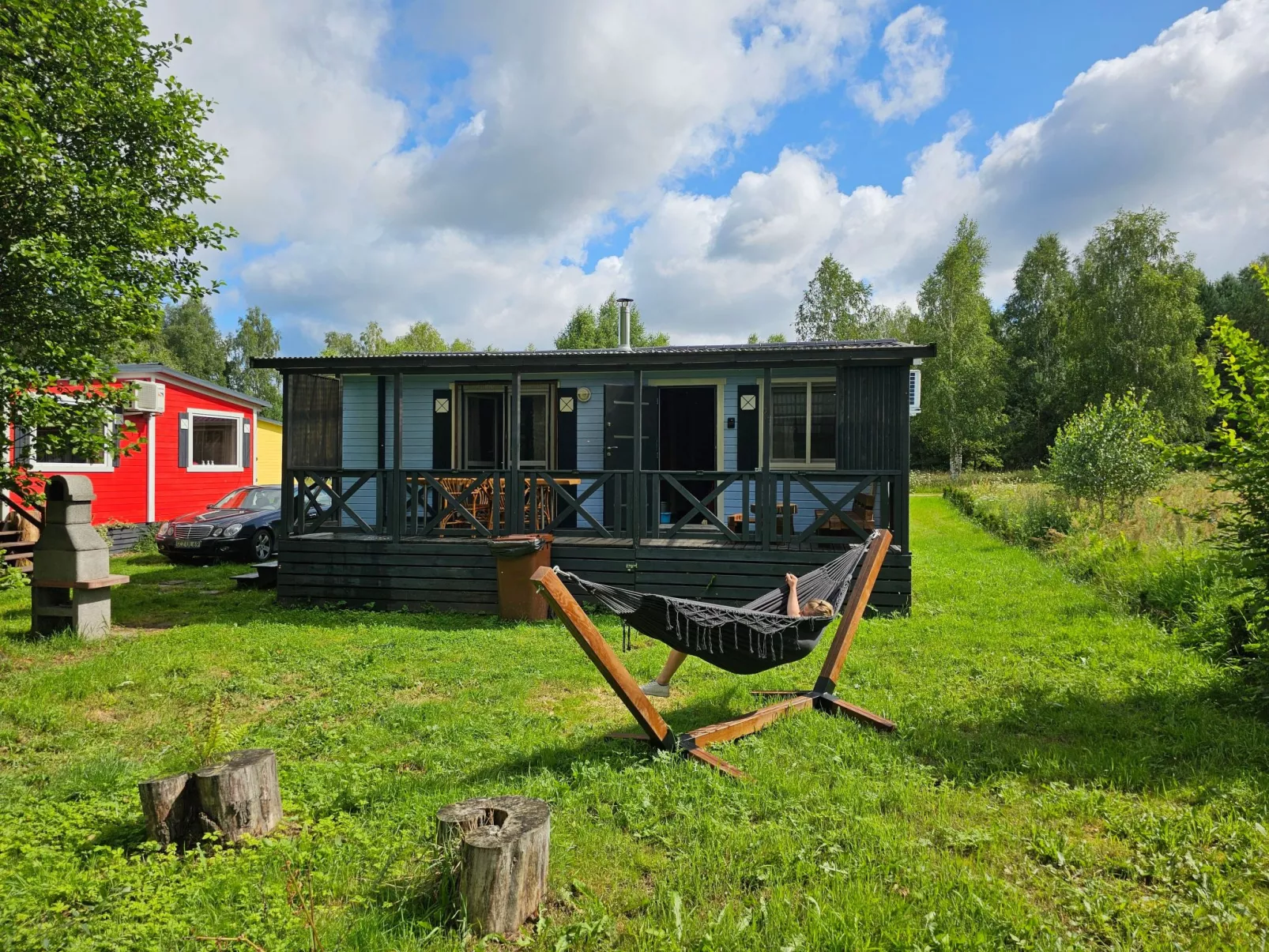 Ganzjährig bewohnbares Ferienhaus - rot-Buiten