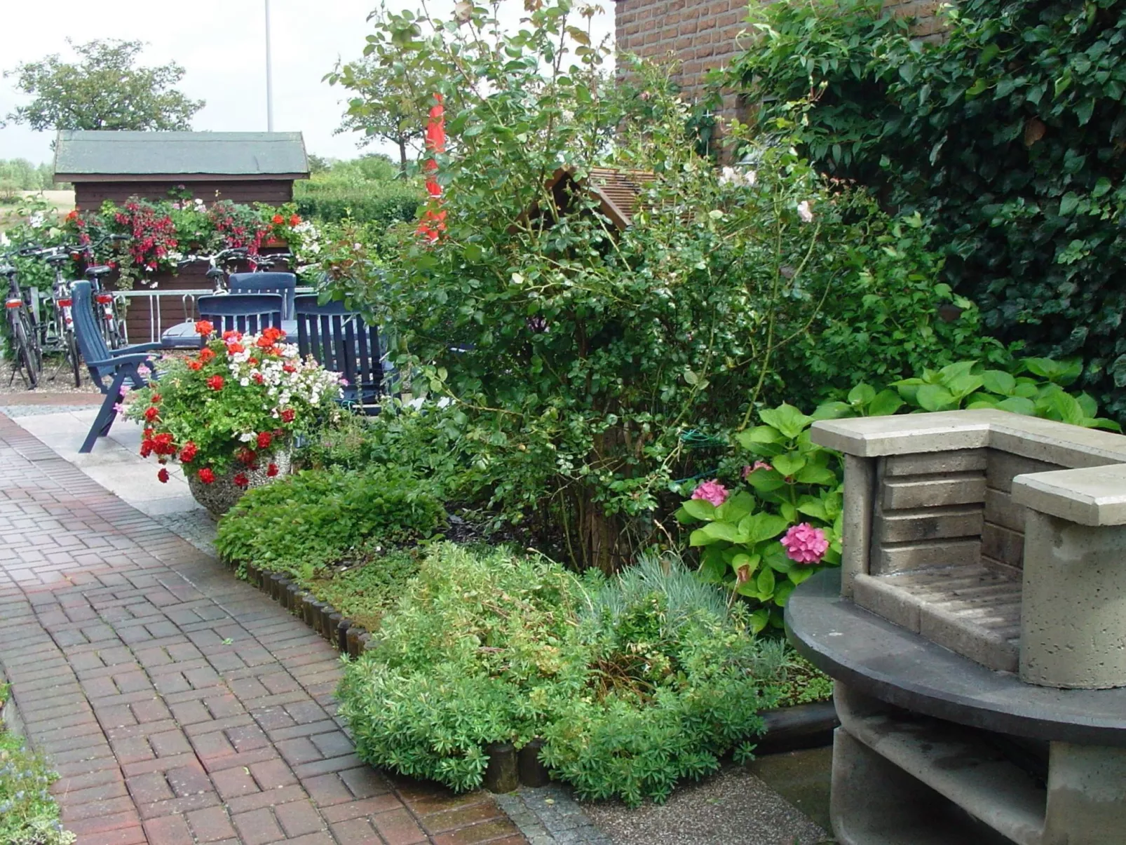 Wohnung in Neue Tiefe mit Terrasse, Garten und Grill-Buiten