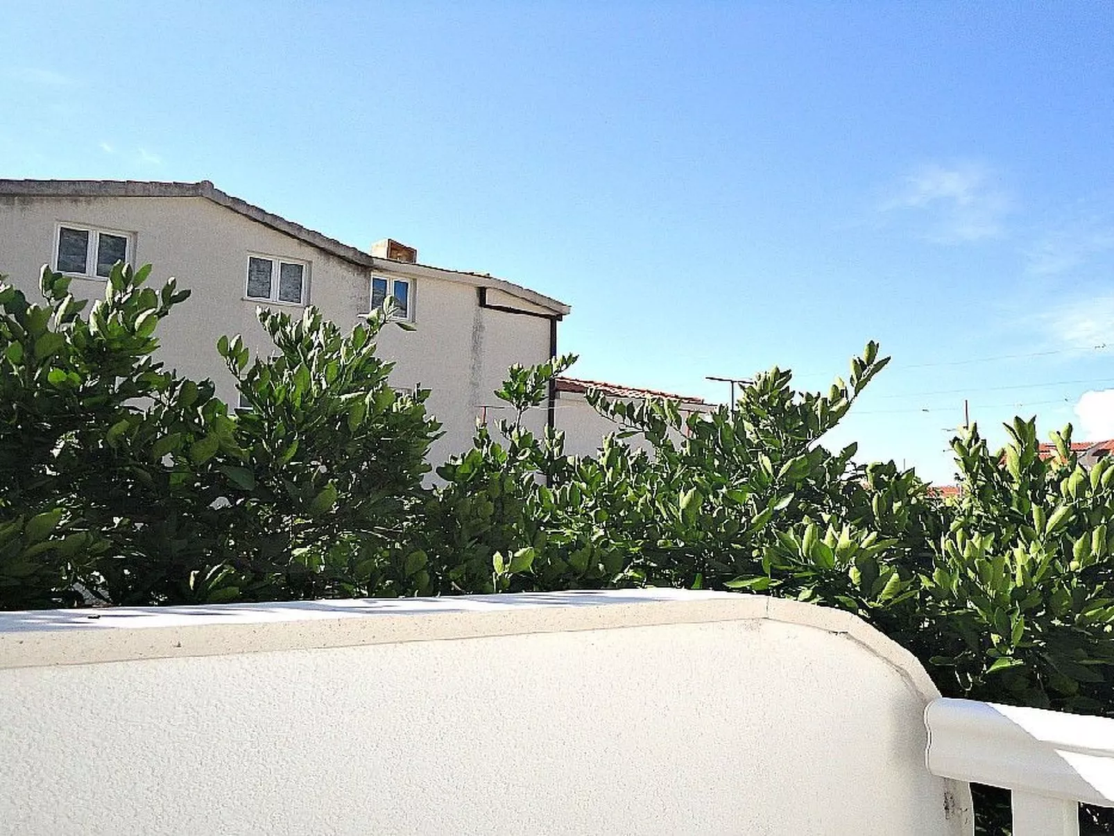 Mit Balkon in Strandnähe - Buiten