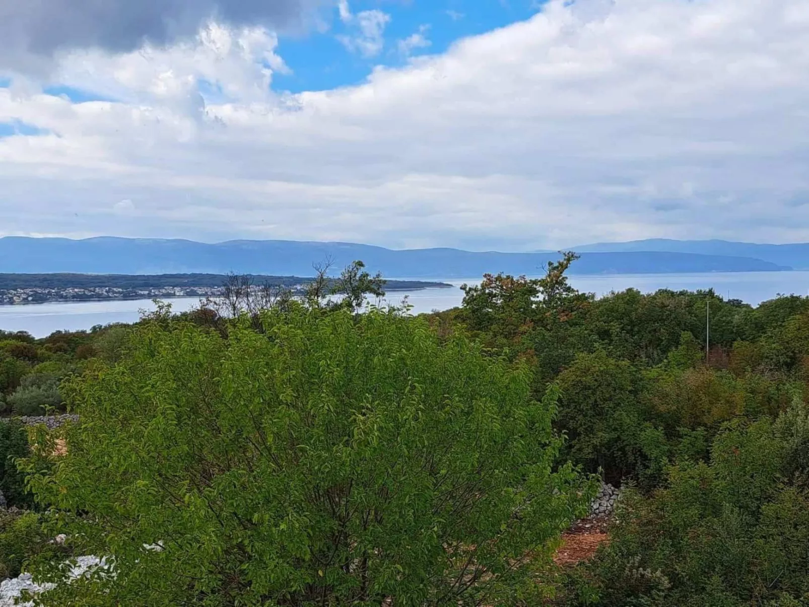 Wunderschöne Ferienwohnung, mit Meerblick und Pool-Buiten