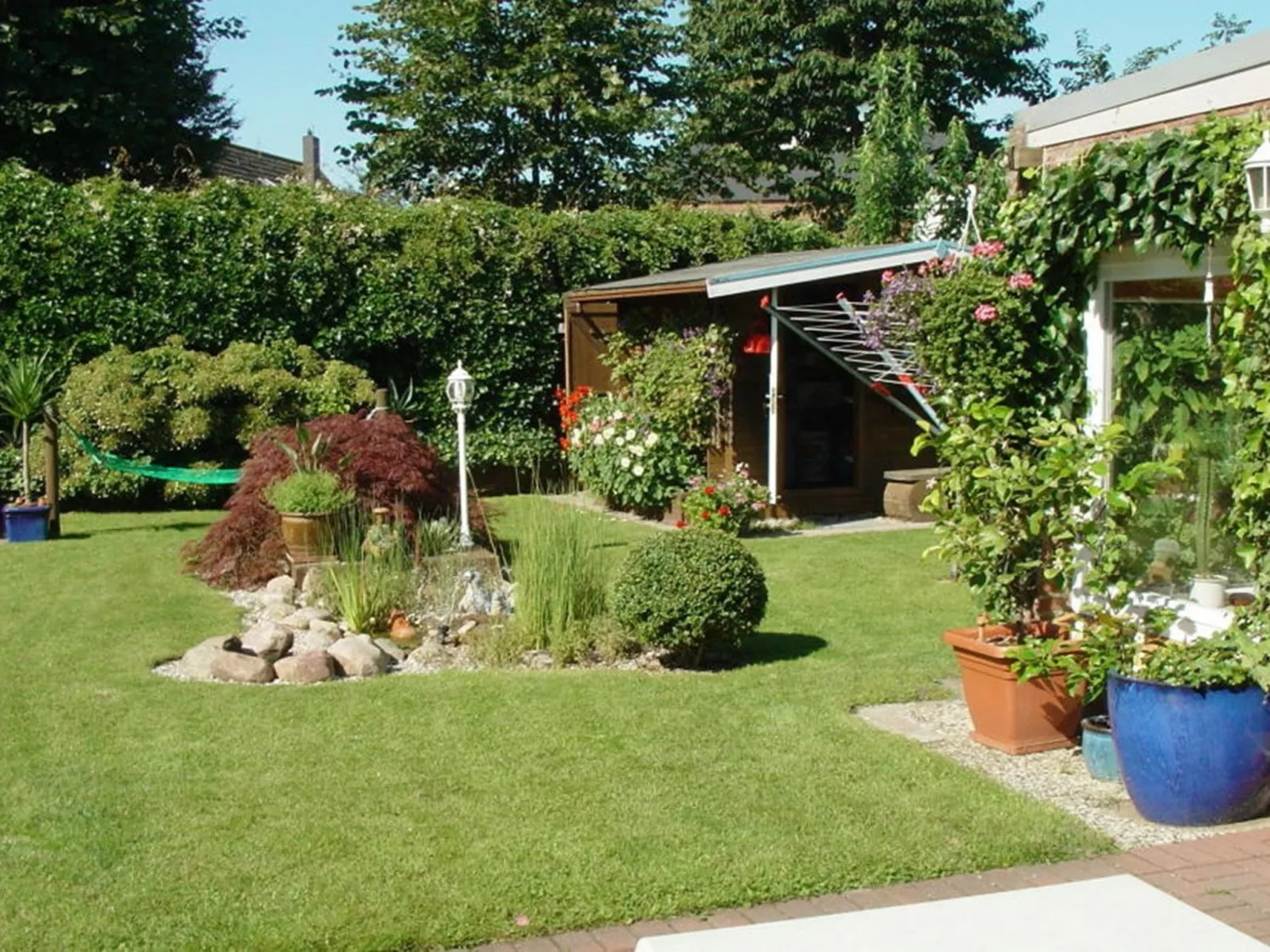 Wohnung in Neue Tiefe mit Terrasse, Garten und Grill-Buiten