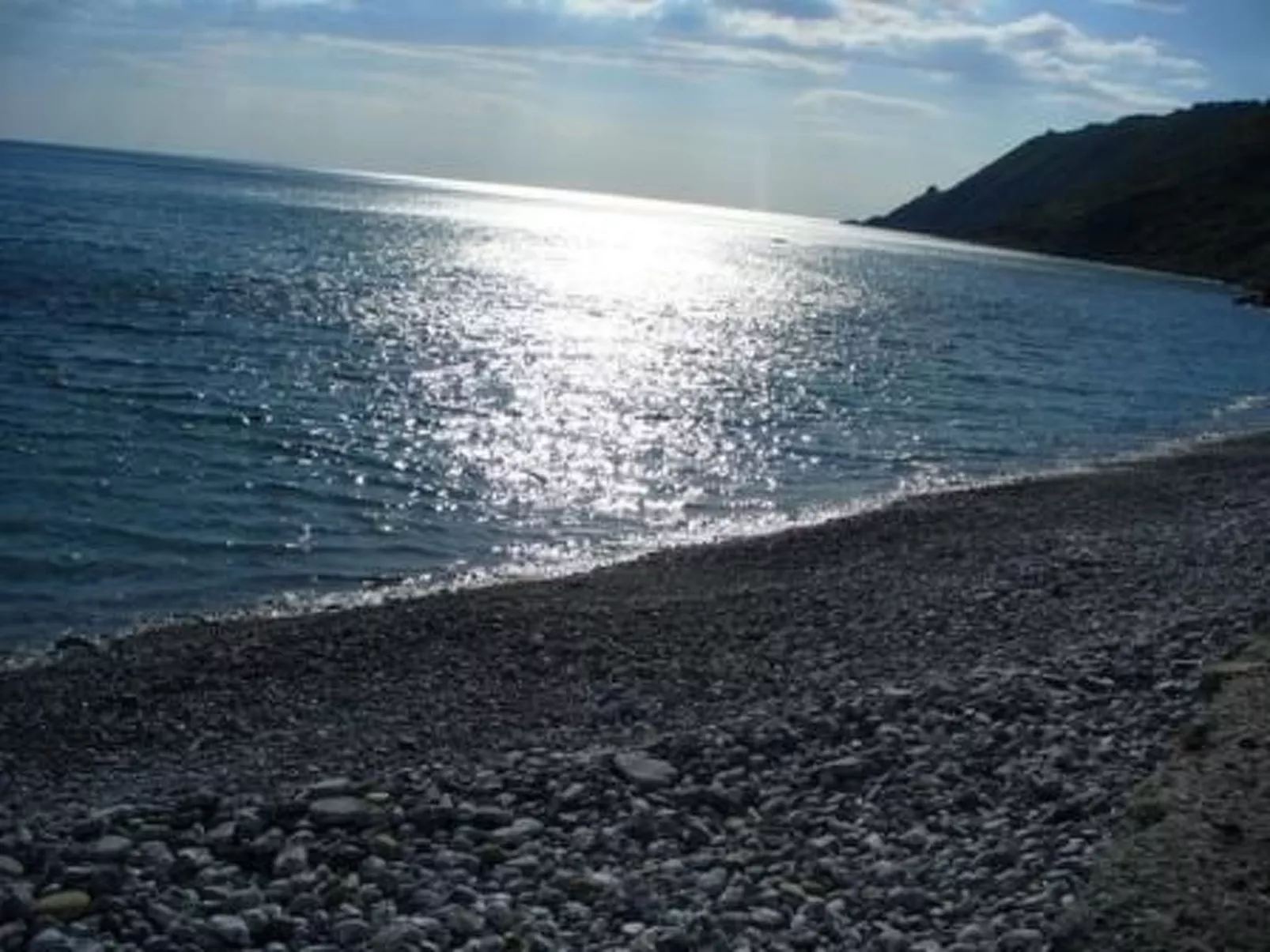 Strandnahe Ferienwohnung mit Garten und Grill - Buiten