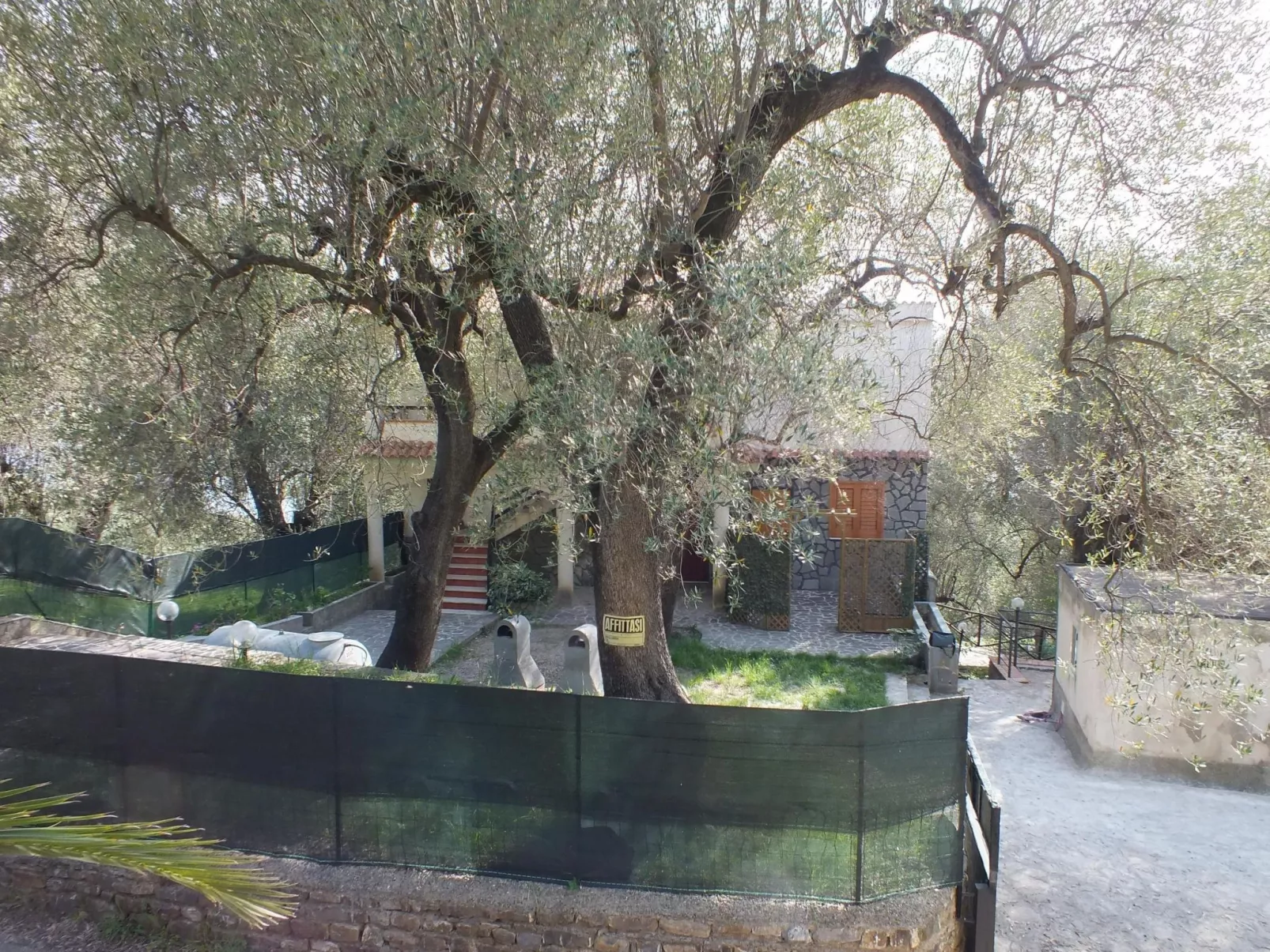 Strandnahe Ferienwohnung mit Garten und Grill - Buiten