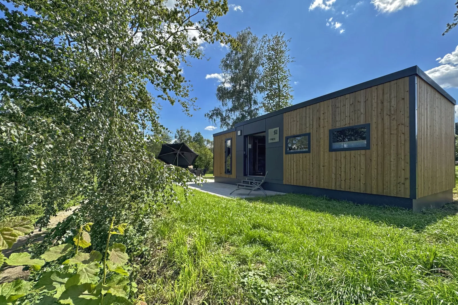 FERIENDORF SEEBLICK - Tiny Chalet am Eixendorfer See-Buitenkant zomer