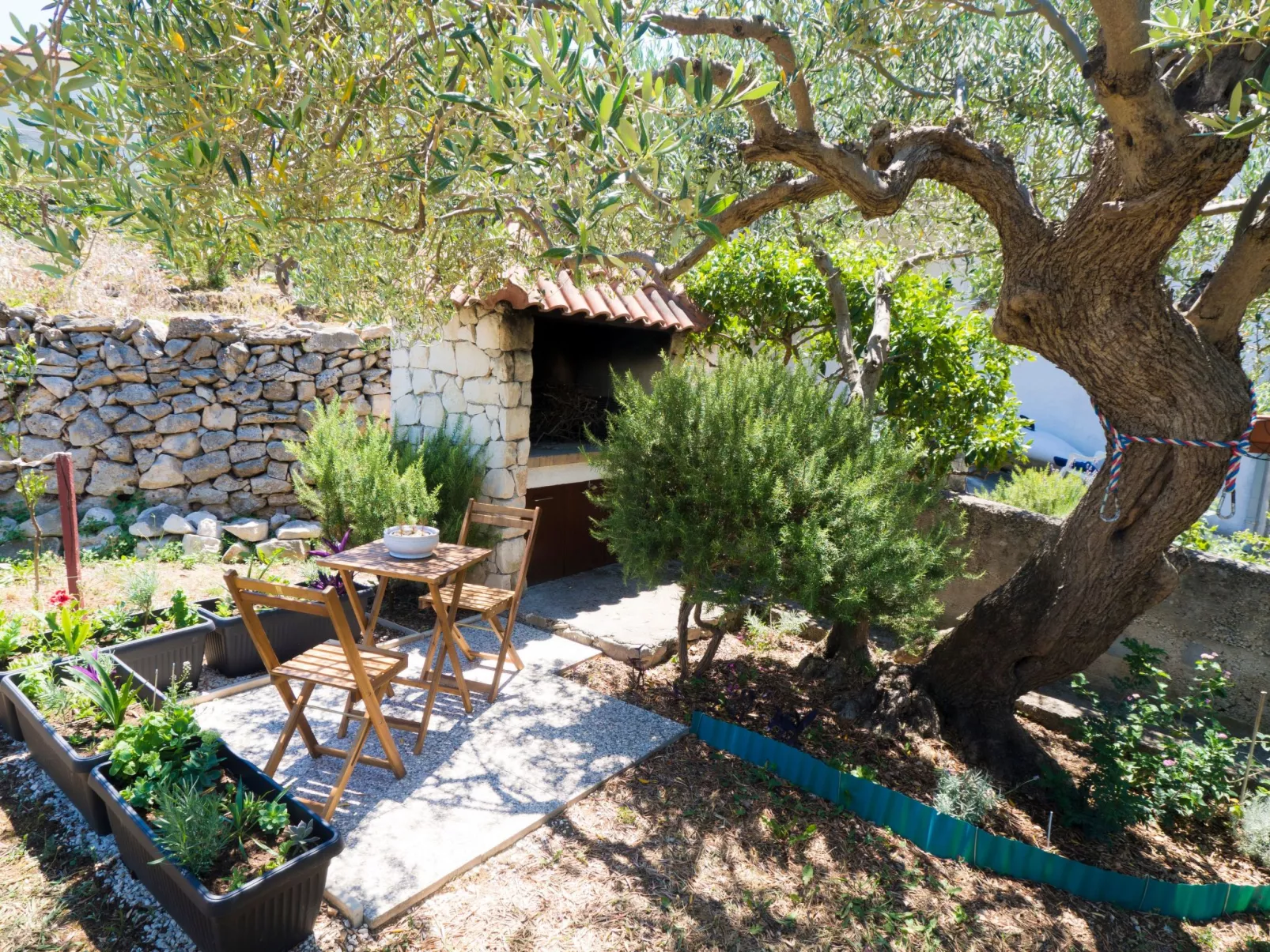 Strandnahe Ferienwohnung mit großer Terrasse-Buiten