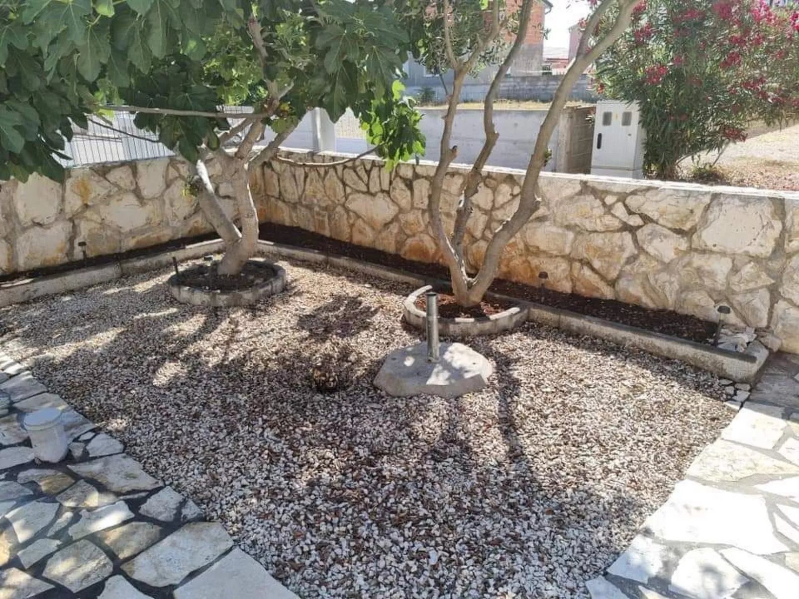 Charmante, sonnige Ferienwohnung - Buiten