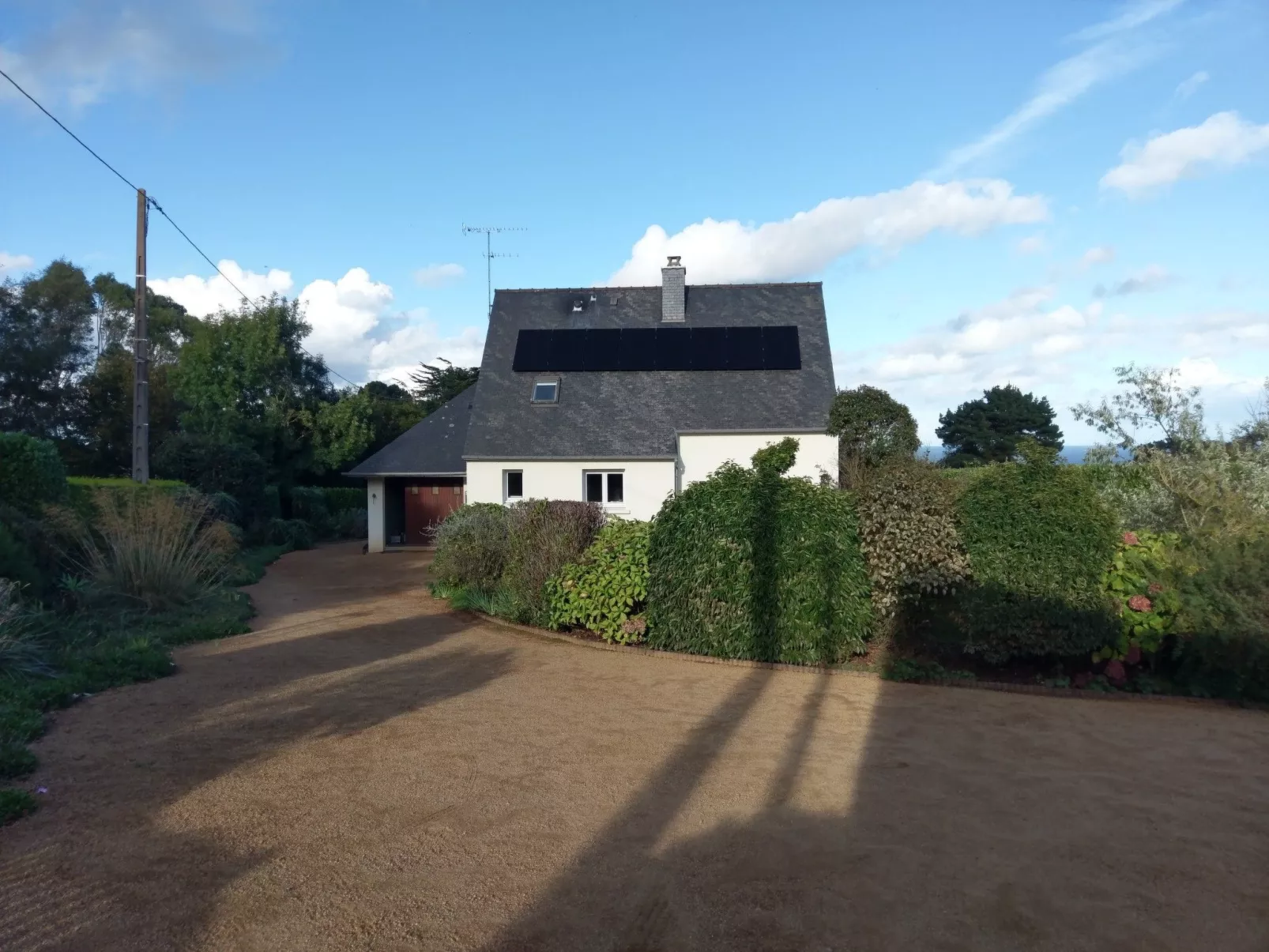 Komforthaus mit Traumgarten und Meerblick-Buiten