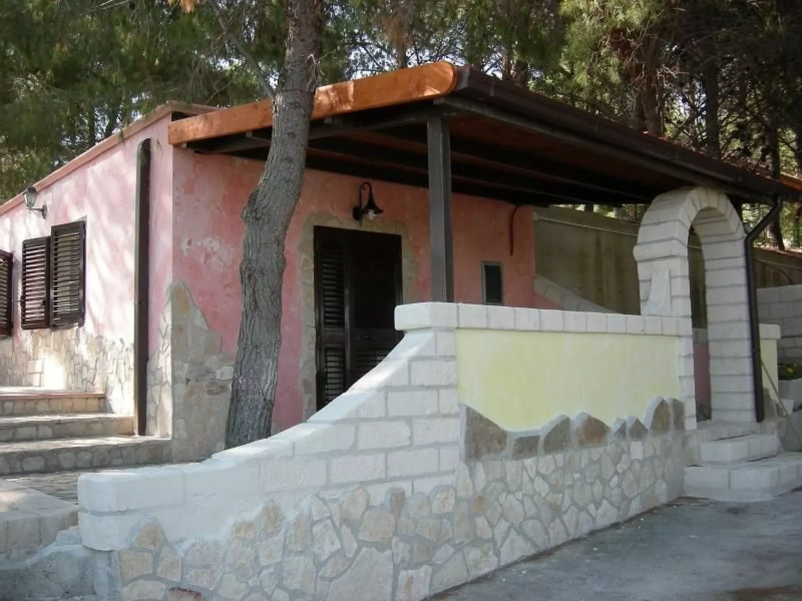 Orchideen-Ferienwohnung mit überdachter Veranda