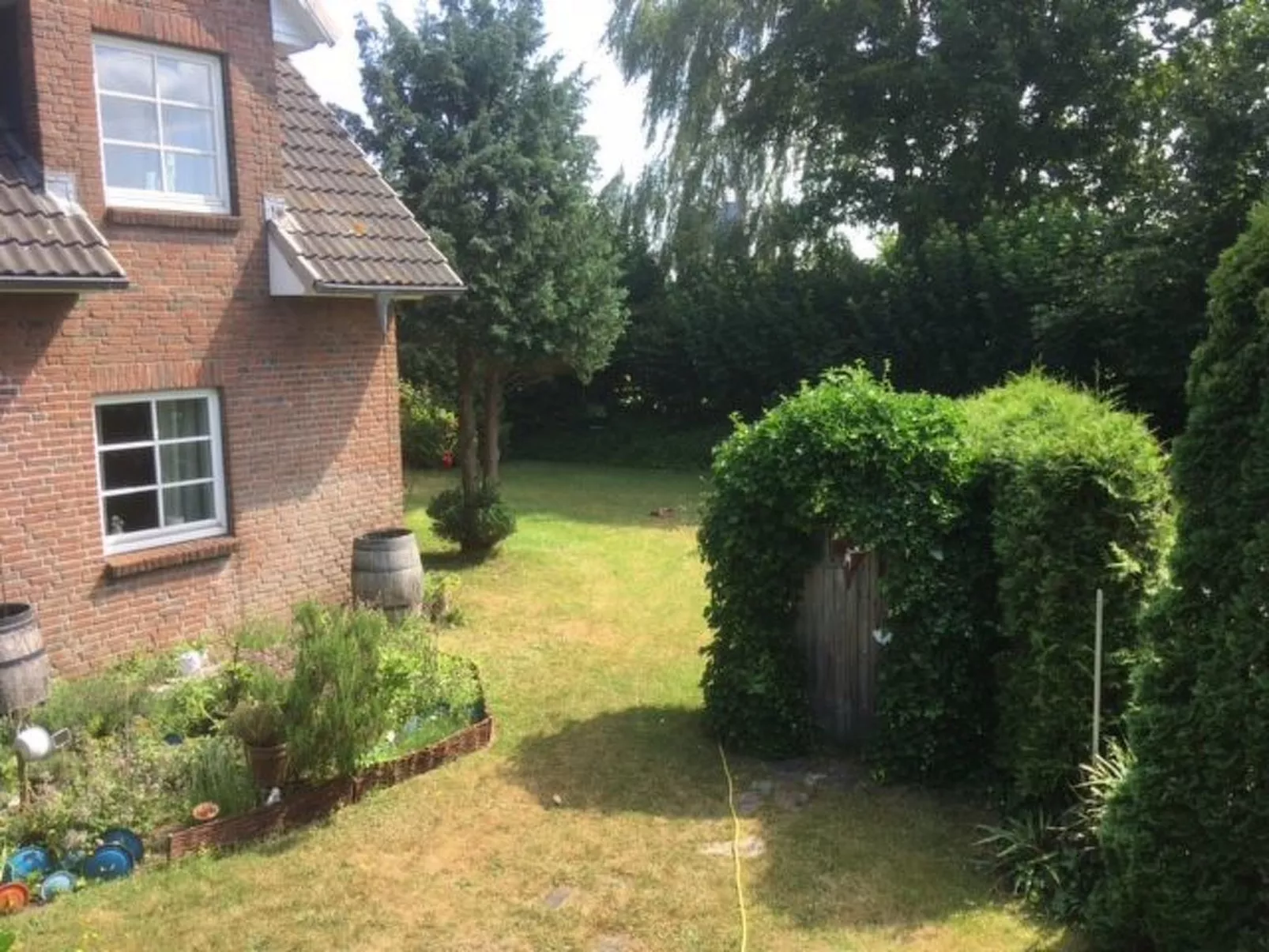 Modernisierte Ferienwohnung mit Balkon-Buiten