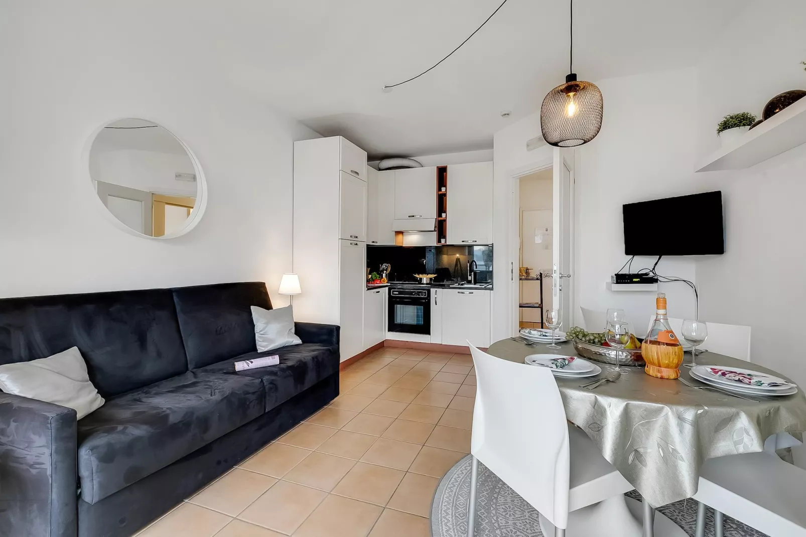 RESIDENCE PORTO LETIZIA - PALACE-1ROOM APT 4 PAX LAKE VIEW DELUXE 8206 - P1LD4 - Woonkamer