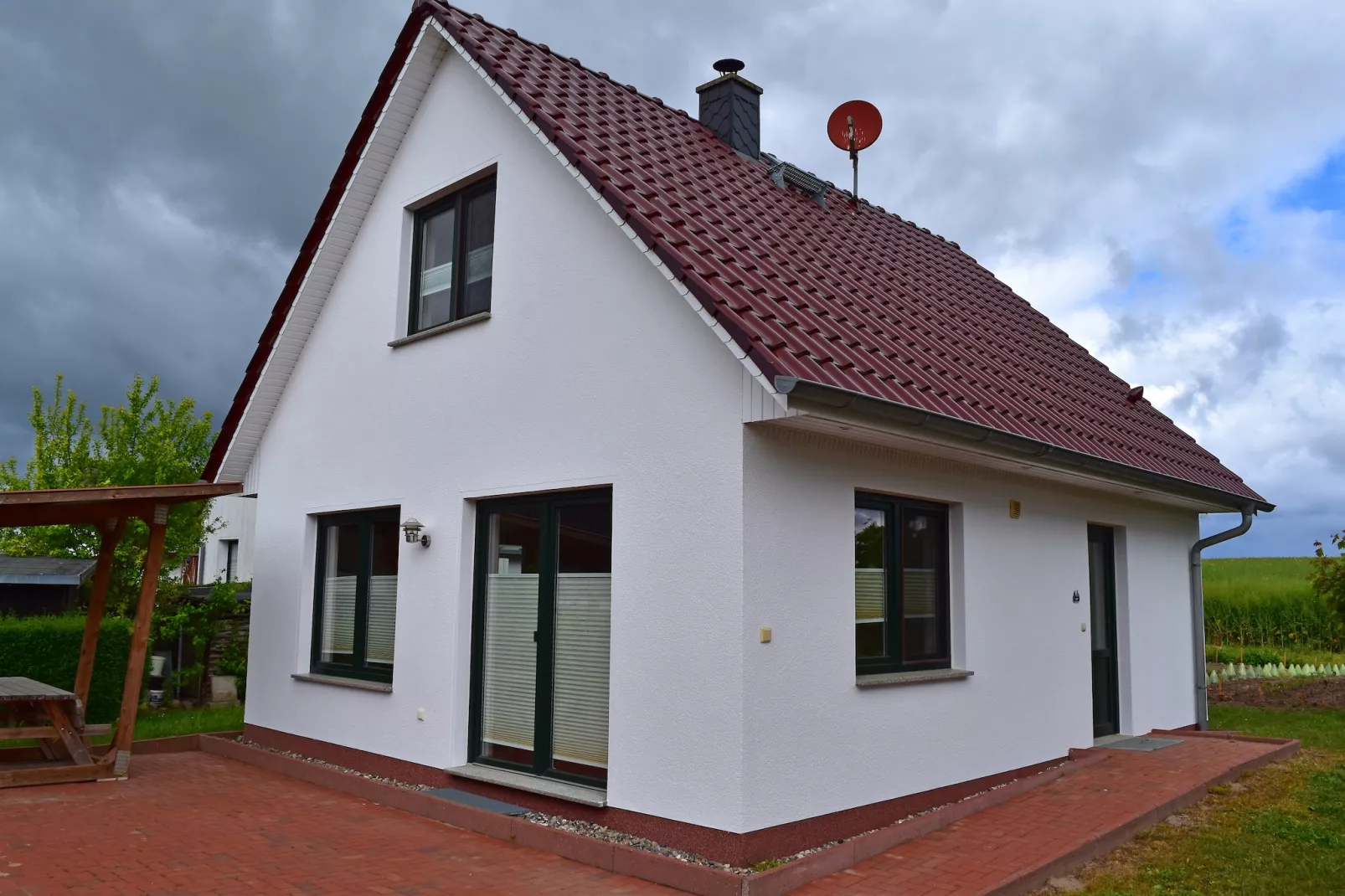 Strandnahes Ferienhaus Klaus mit Weitblick - Buitenkant zomer