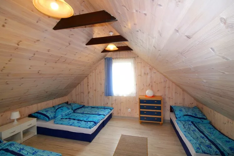 Piętrowe domki wakacyjne z 1 sypialnią w Rewalu-Slaapkamer