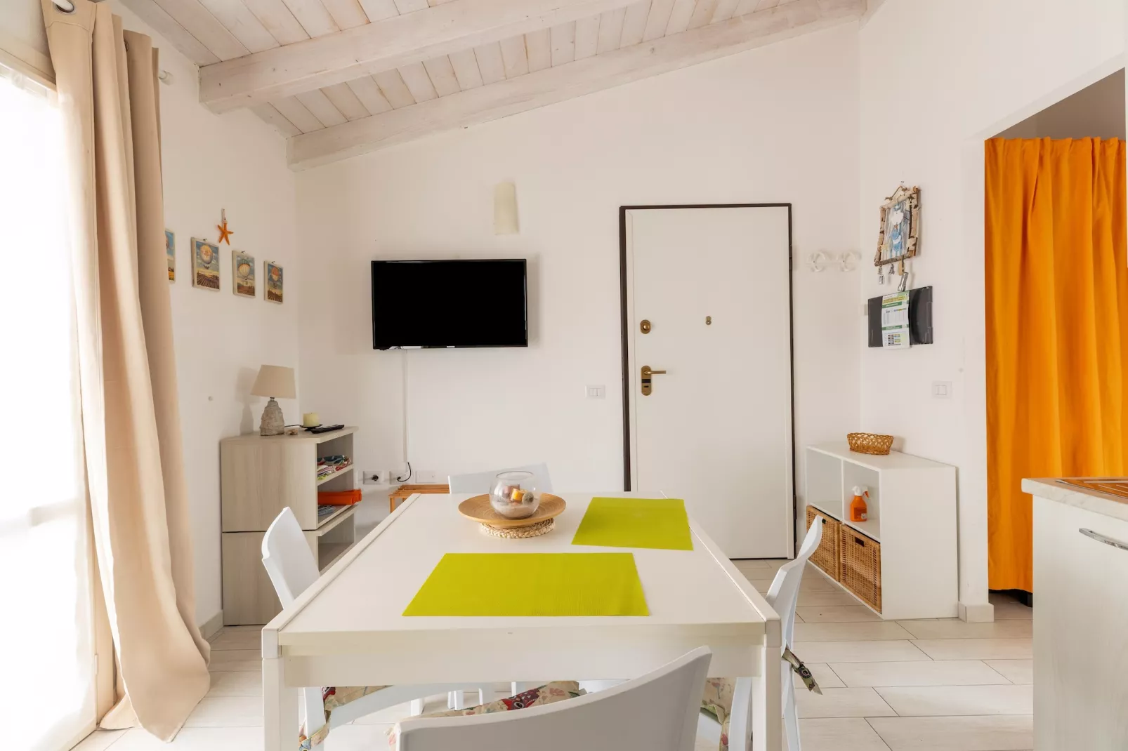 ATTICO BADESI CON PISCINA - Eetkamer