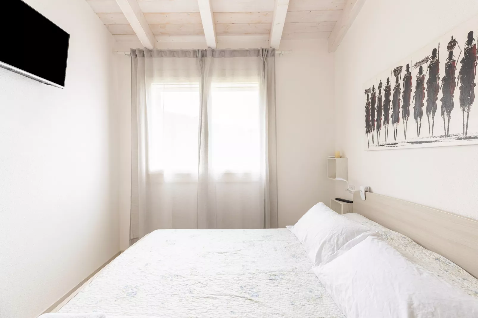 ATTICO BADESI CON PISCINA - Slaapkamer