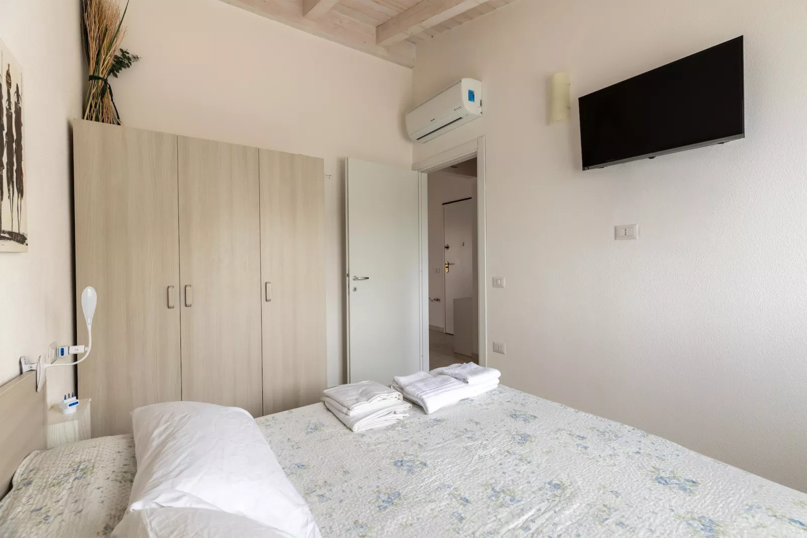 ATTICO BADESI CON PISCINA - Slaapkamer