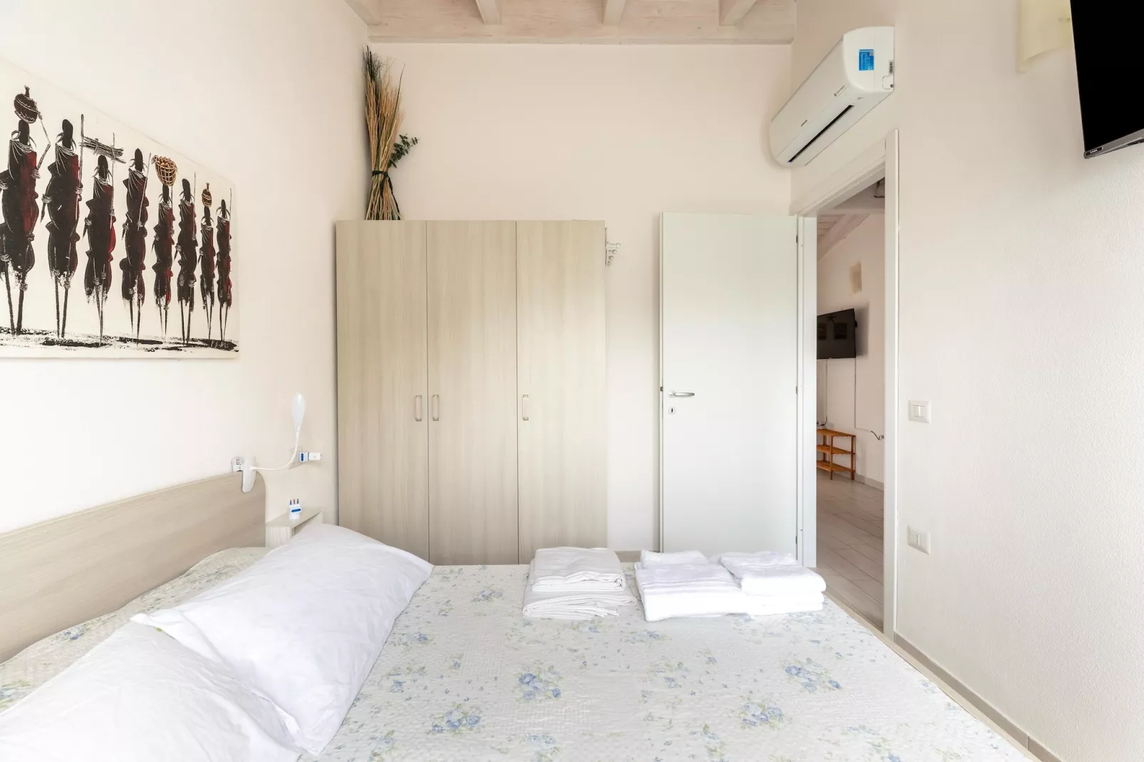 ATTICO BADESI CON PISCINA - Slaapkamer