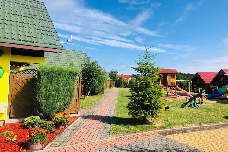 Domki wypoczynkowe - Promyczek - Tuinen zomer