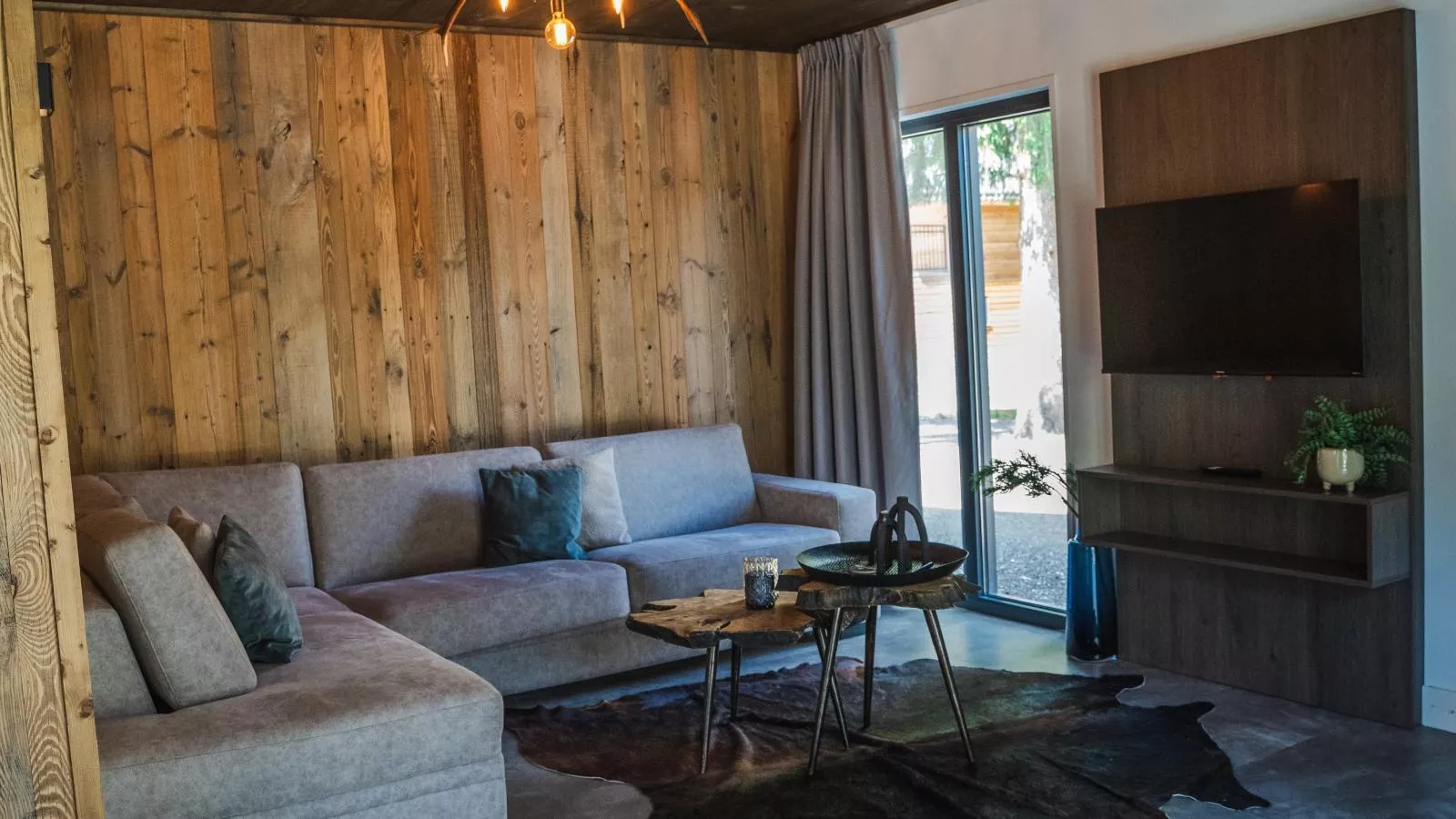 Alpenchalet Nockblick am Afritzer See - Woonkamer