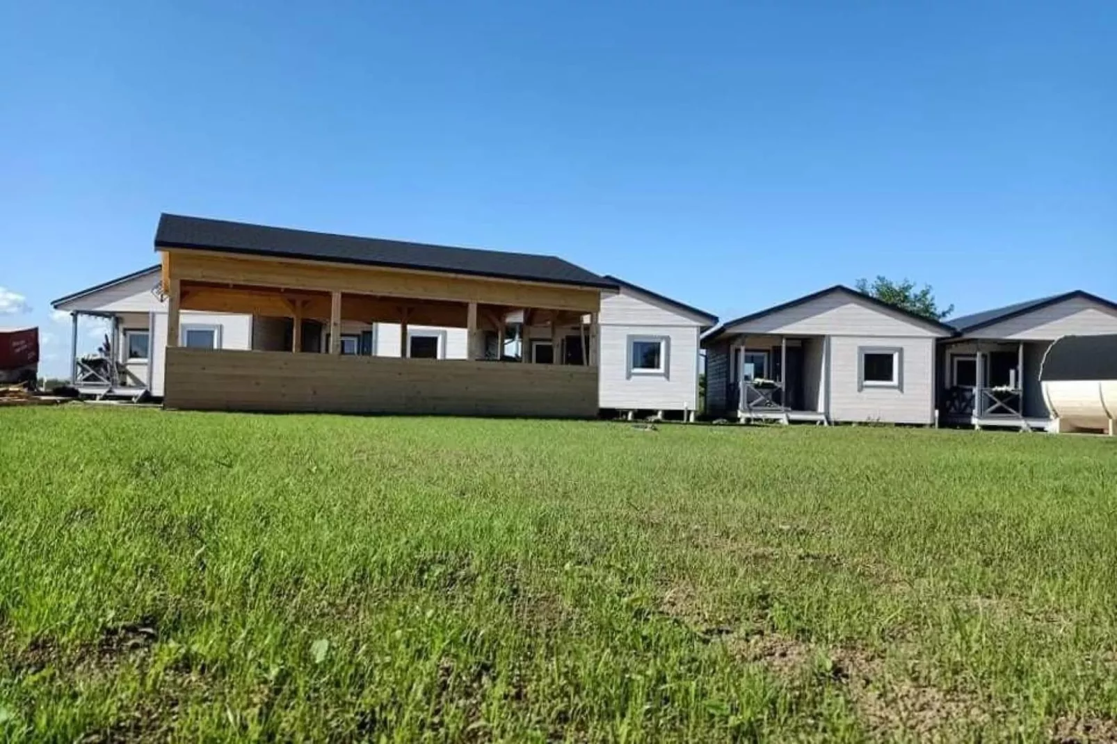 Domki wakacyjne z basenem Gąski-Tuinen zomer