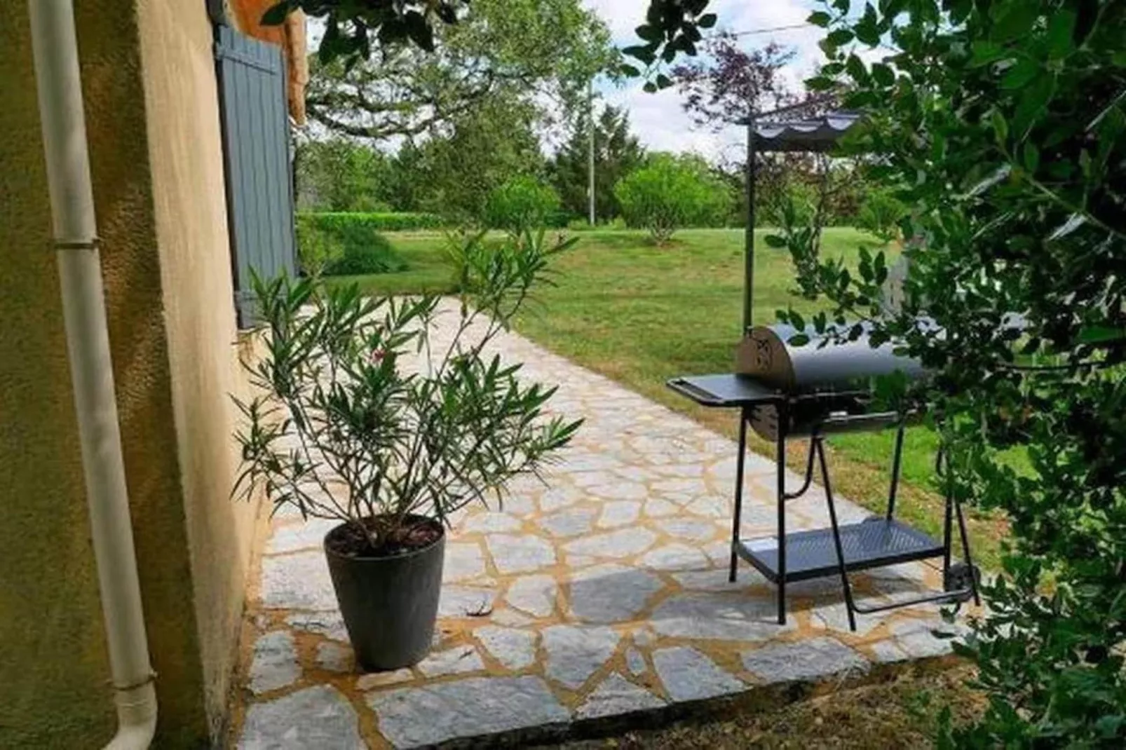 Jolie maison le Catalo - Tuinen zomer