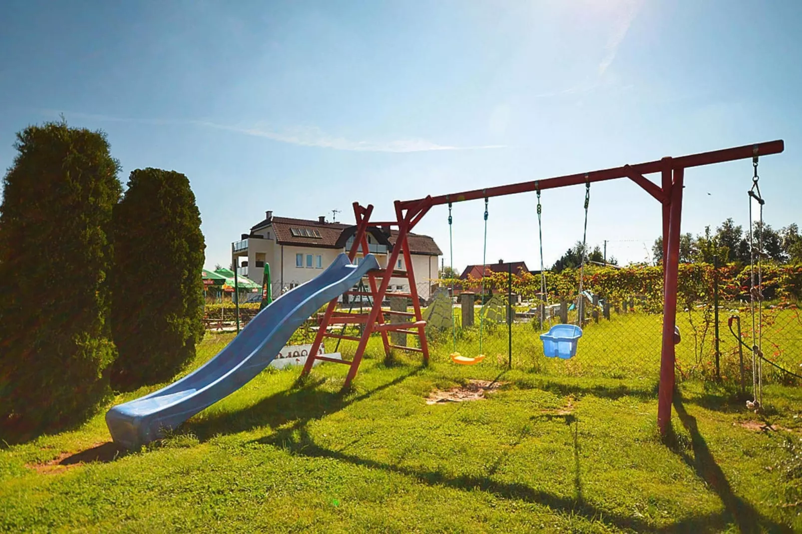 Domki wakacyjne Wicie - Tuinen zomer