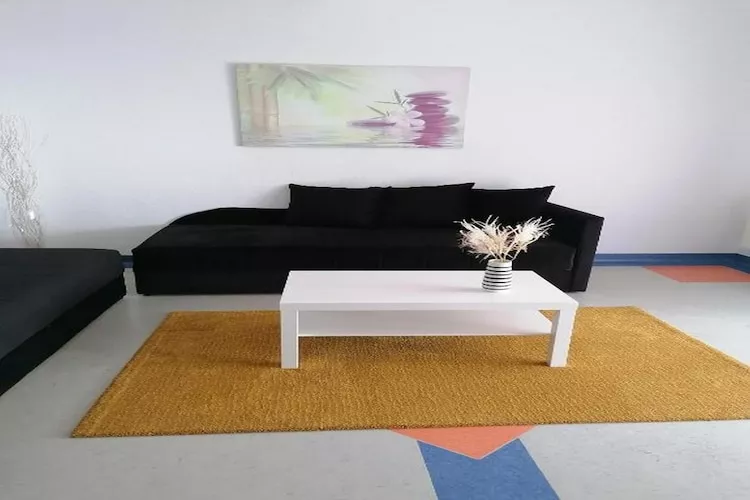 House Panorama - One Bedroom Apartment with Balcony and Sea View (Panoramahaus)-Woonkamer