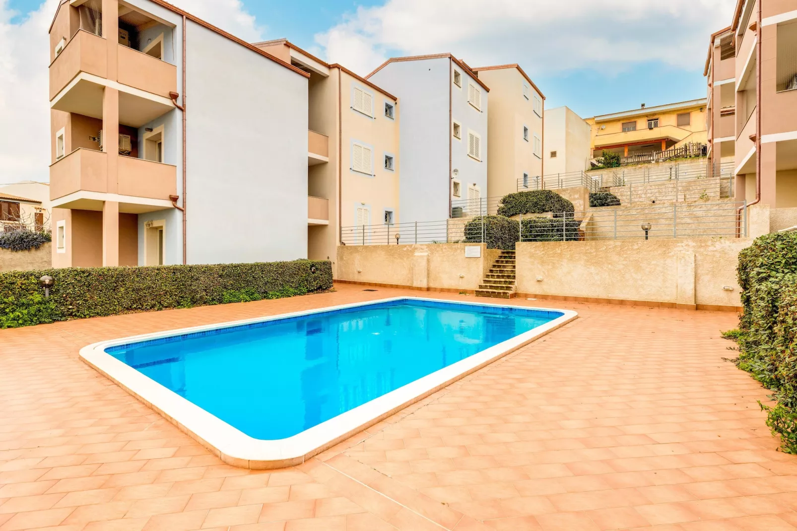 ATTICO BADESI CON PISCINA