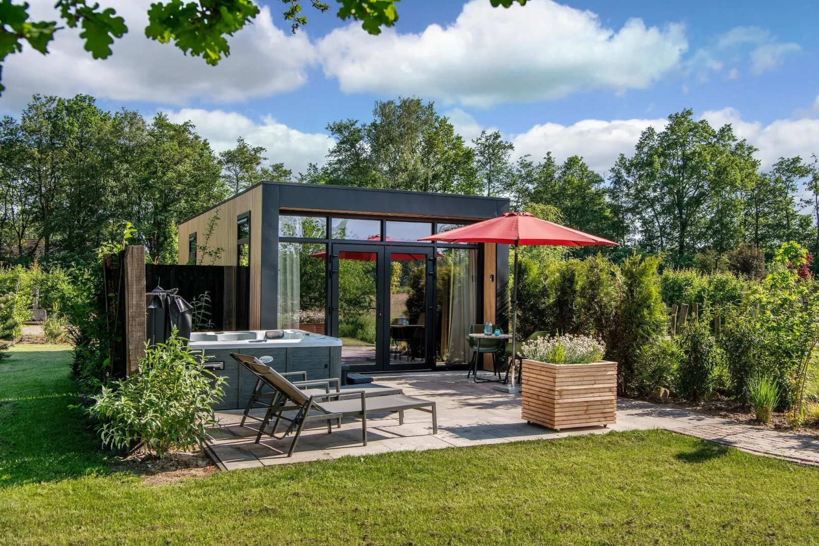 Wellnesslodge Specht 2p-Buitenkant zomer