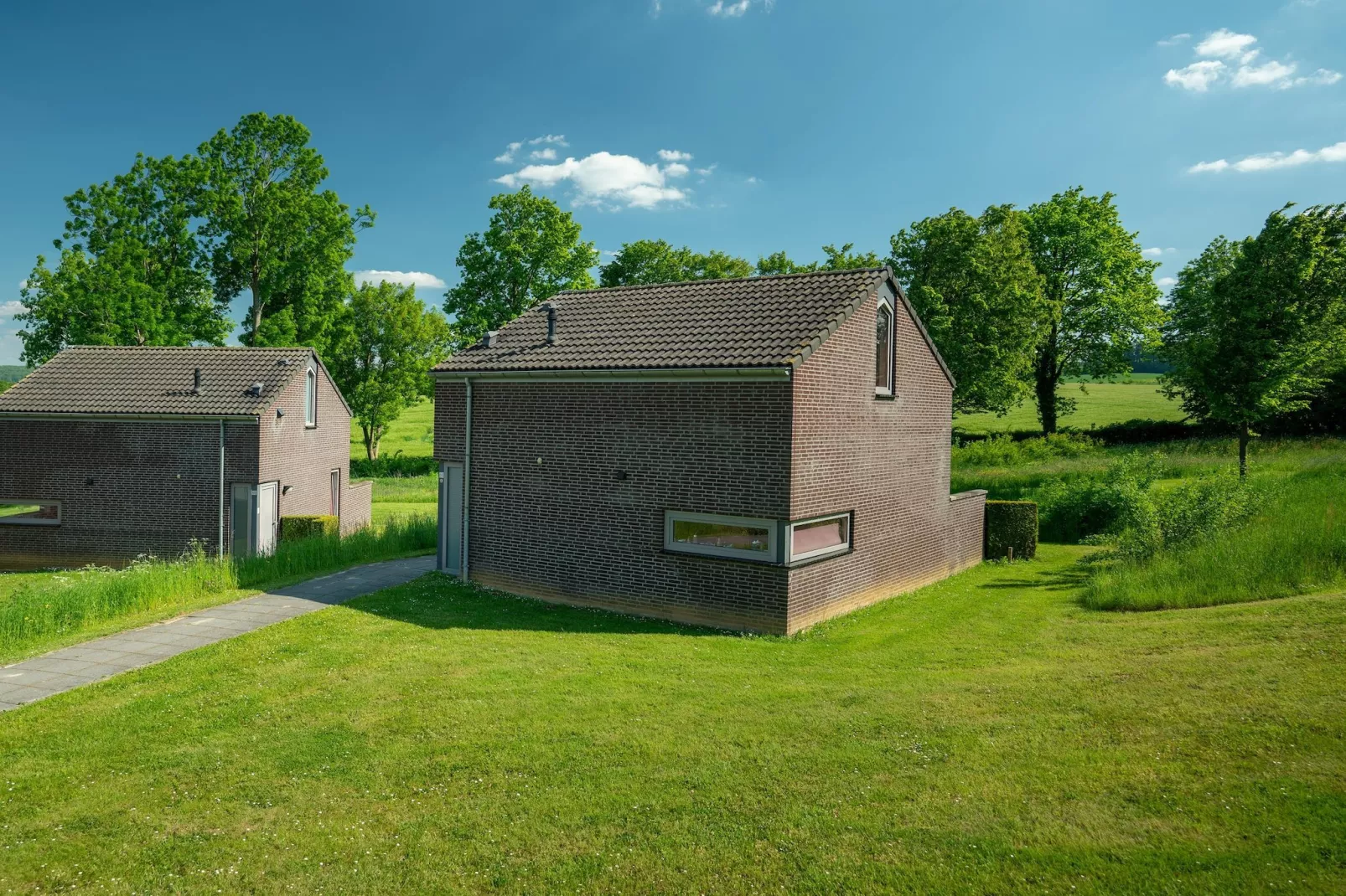 Vakantiepark Reevallis 5 - Buitenkant zomer