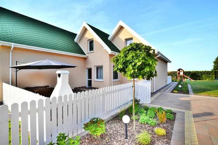 Domki wakacyjne z basenem i jacuzzi Osieki-Buitenkant zomer