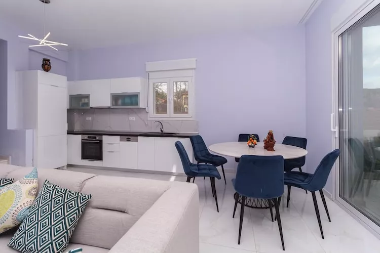 Acrotel Porto Brava Luxury Villas Ormos Panagias 3-bedroom villa 2 - 6 pax - Woonkamer