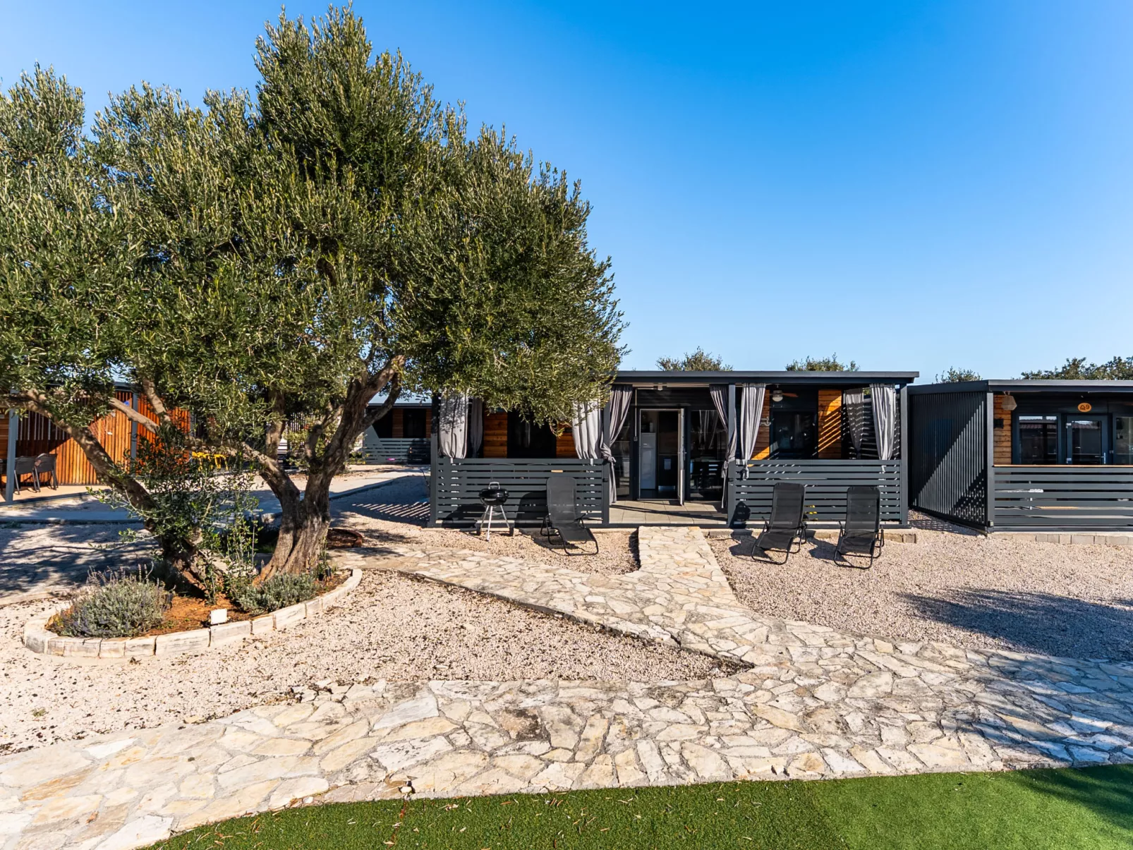 Maslina Delux - Buiten